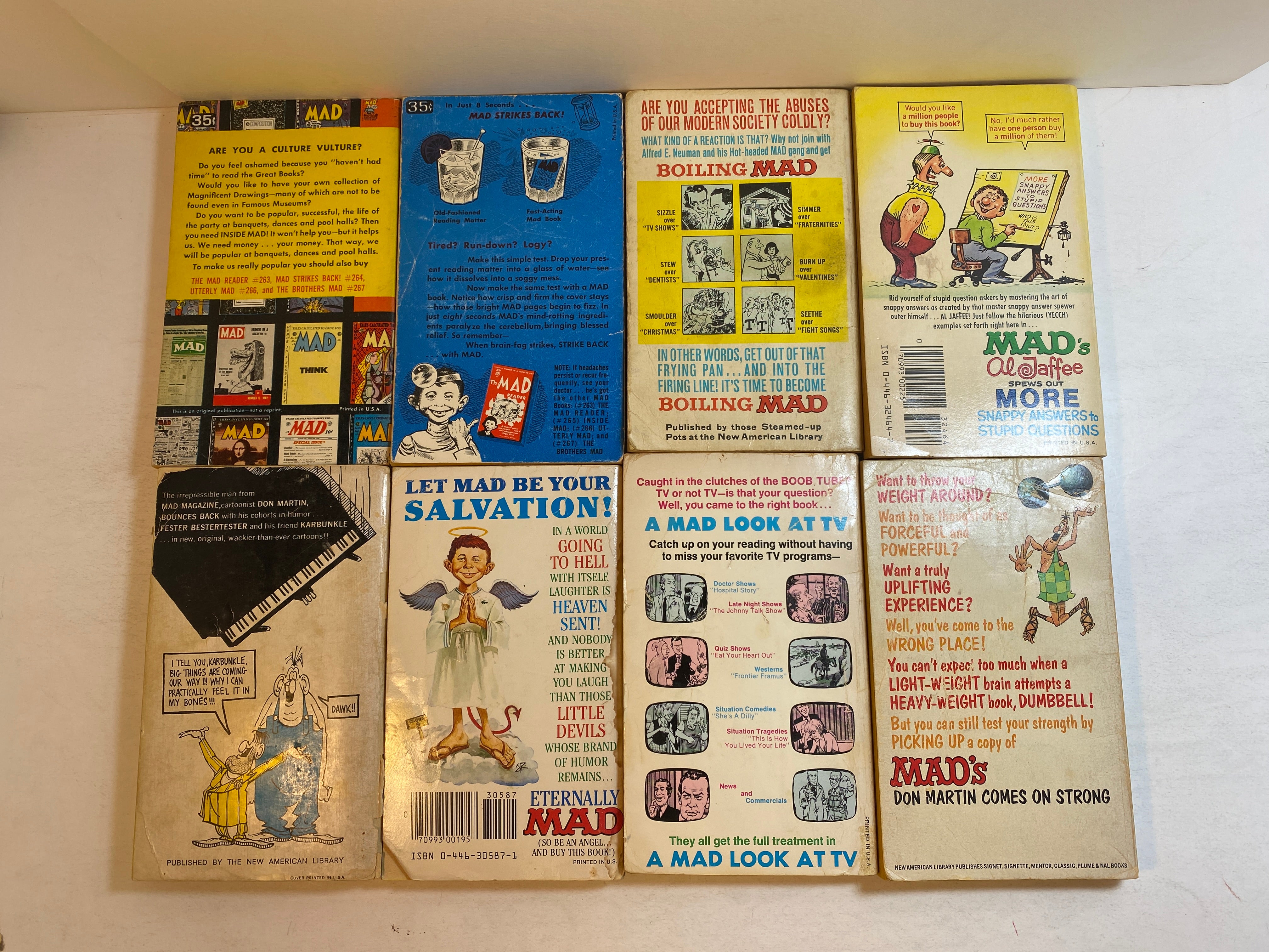 Lot of 8 Vintage Mad Magazine paperbacks 1958-1985