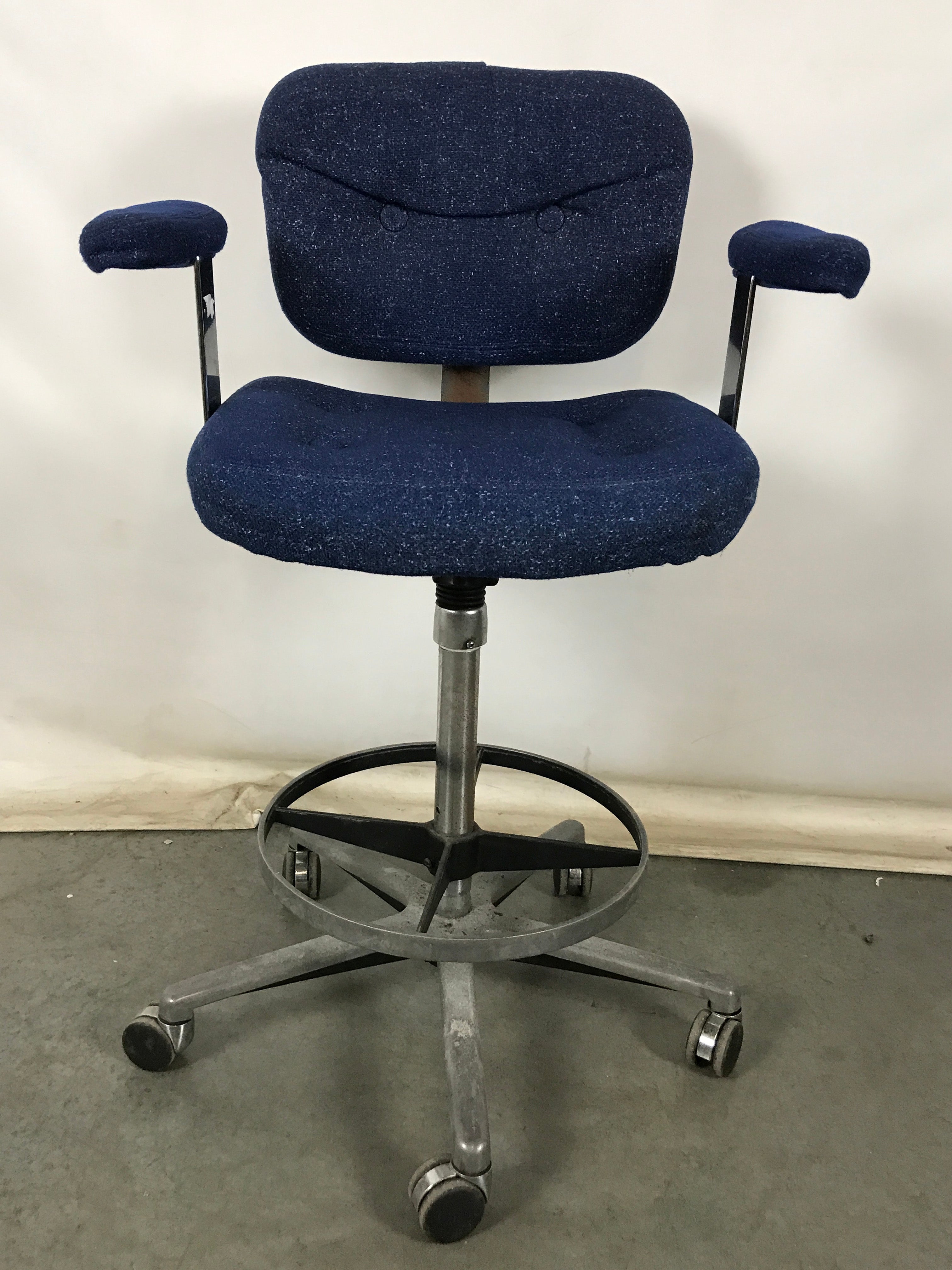 Blue Cushioned Rolling Chair