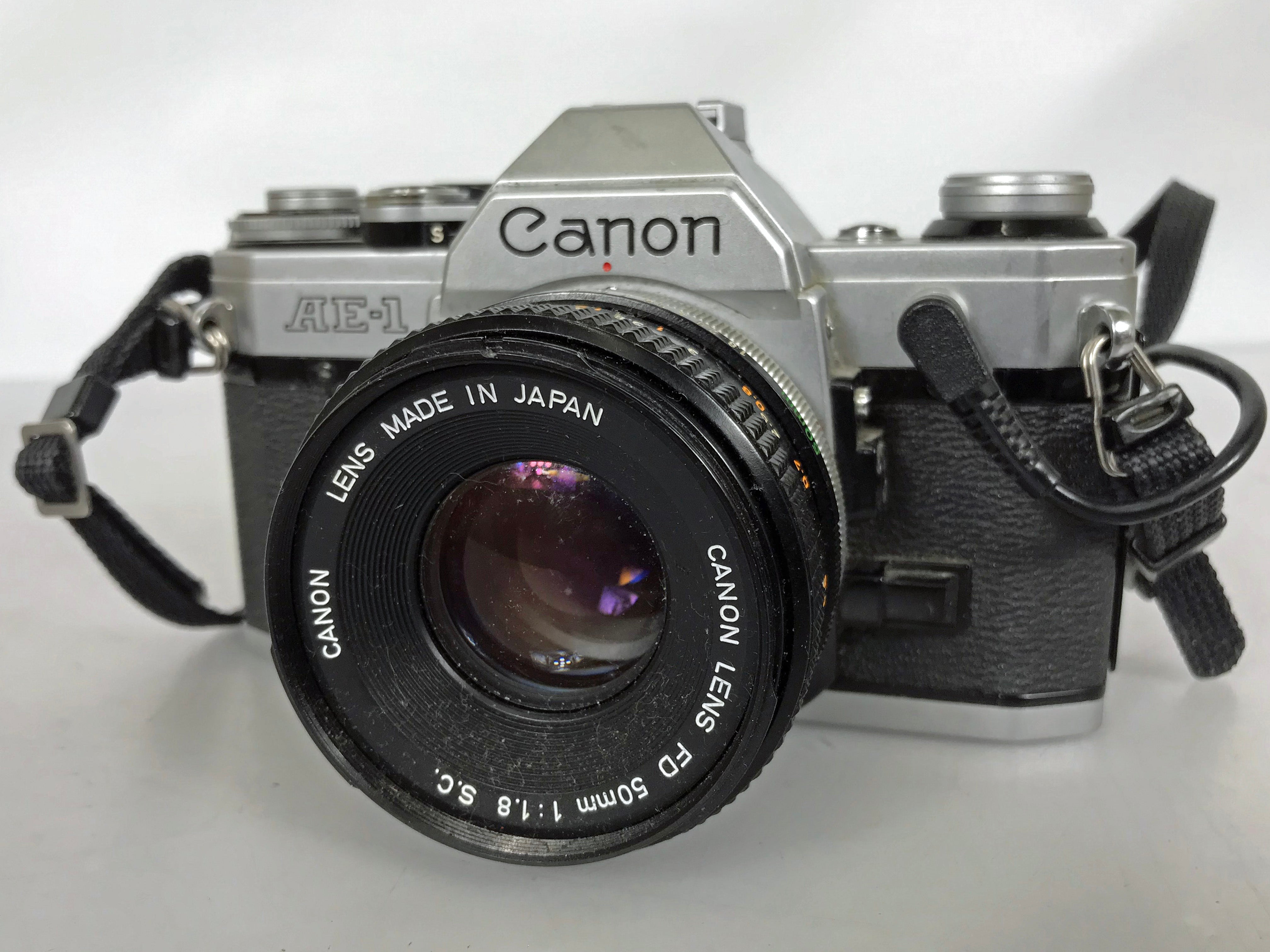 Canon AE-1 35mm SLR Manual Focus Camera (Chrome) with 50mm f/1.8