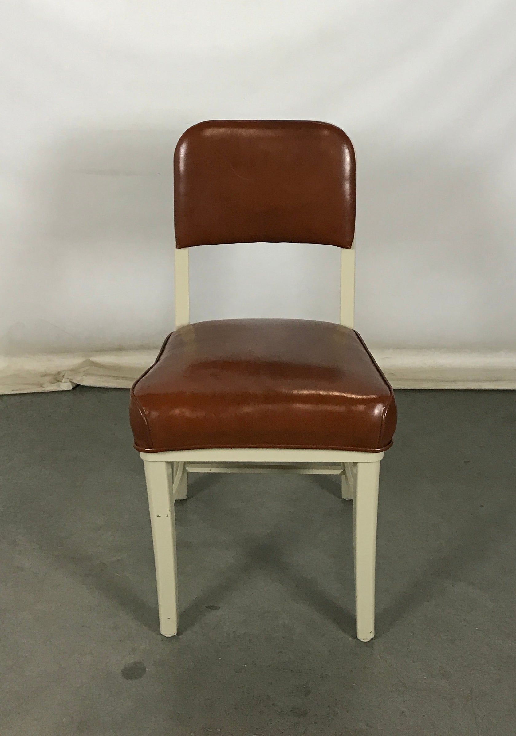 Tan and Brown Metal Chair