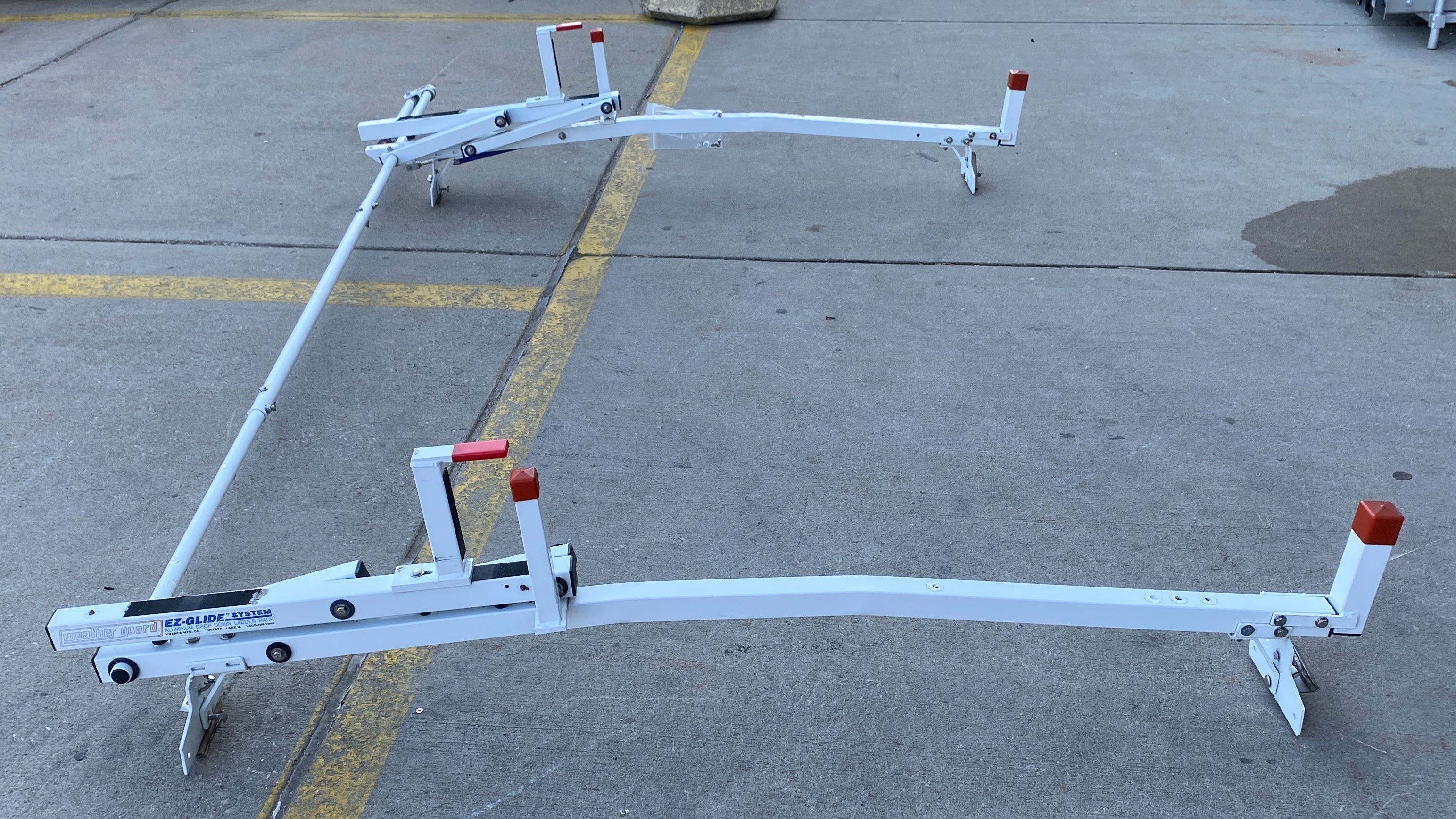 EZ-Glide System Weather Guard Drop Down Ladder Rack