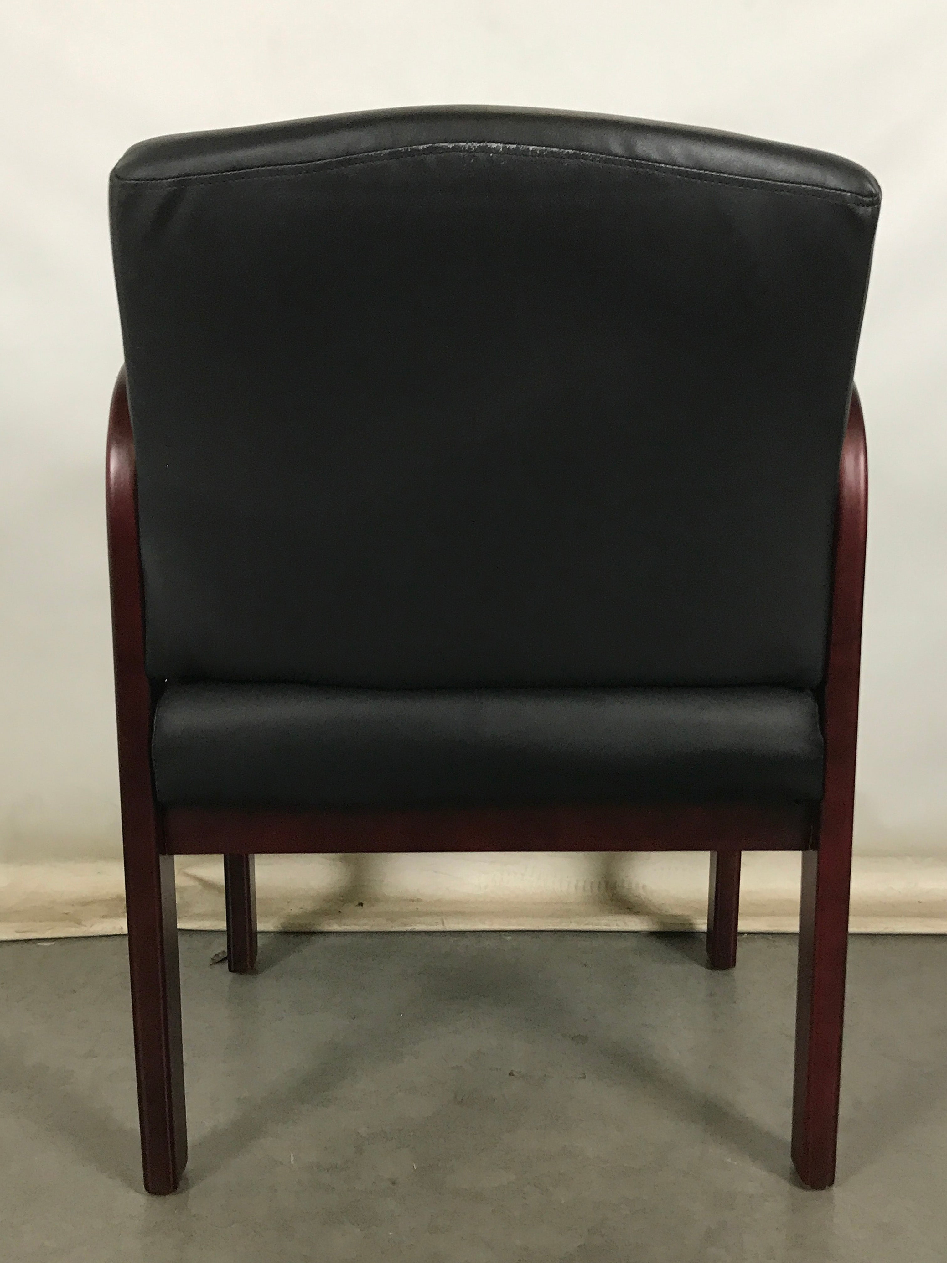 Black Chair with Cherry Colored Wooden Frame