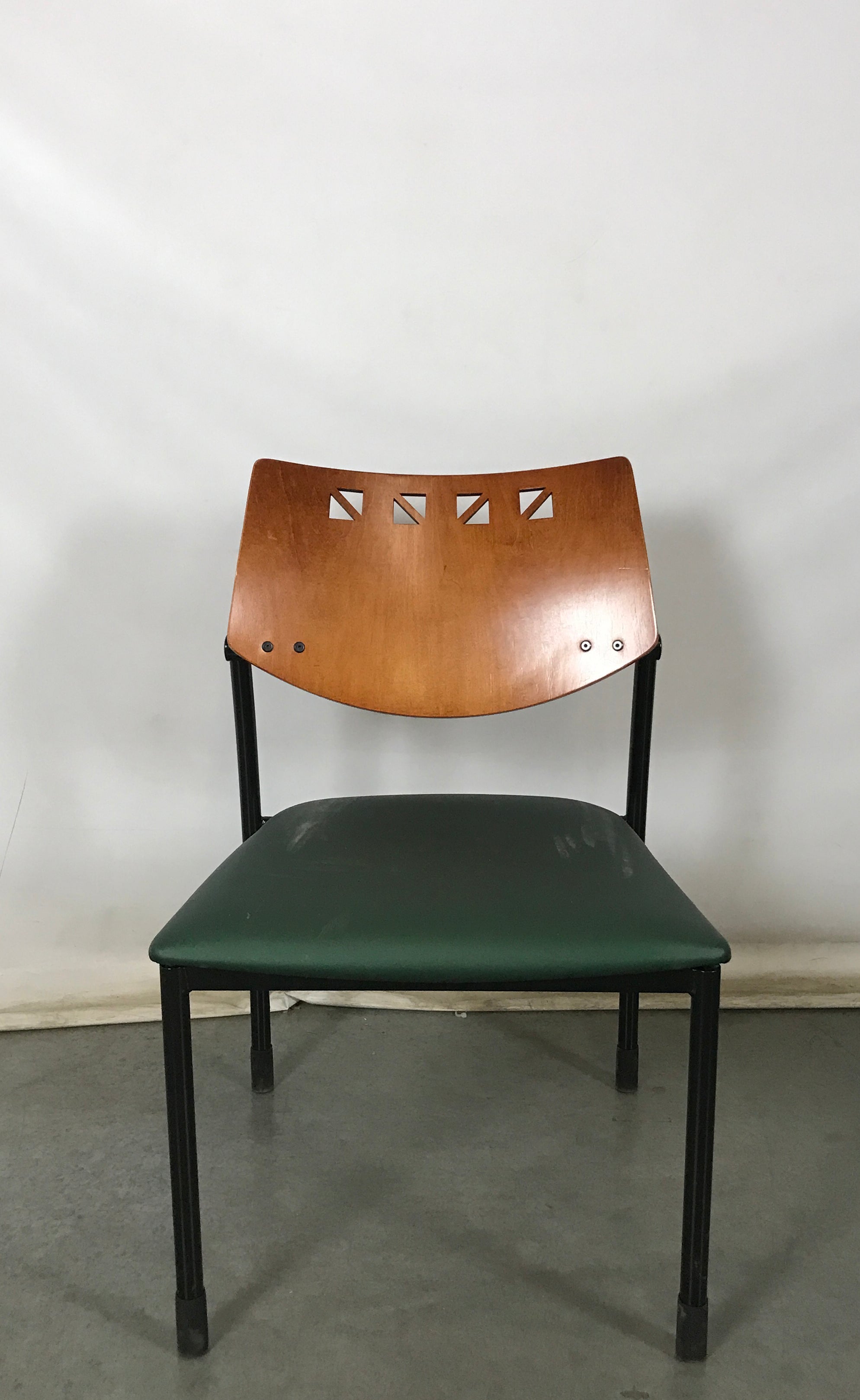 Green Plump Chair with Wooden Back