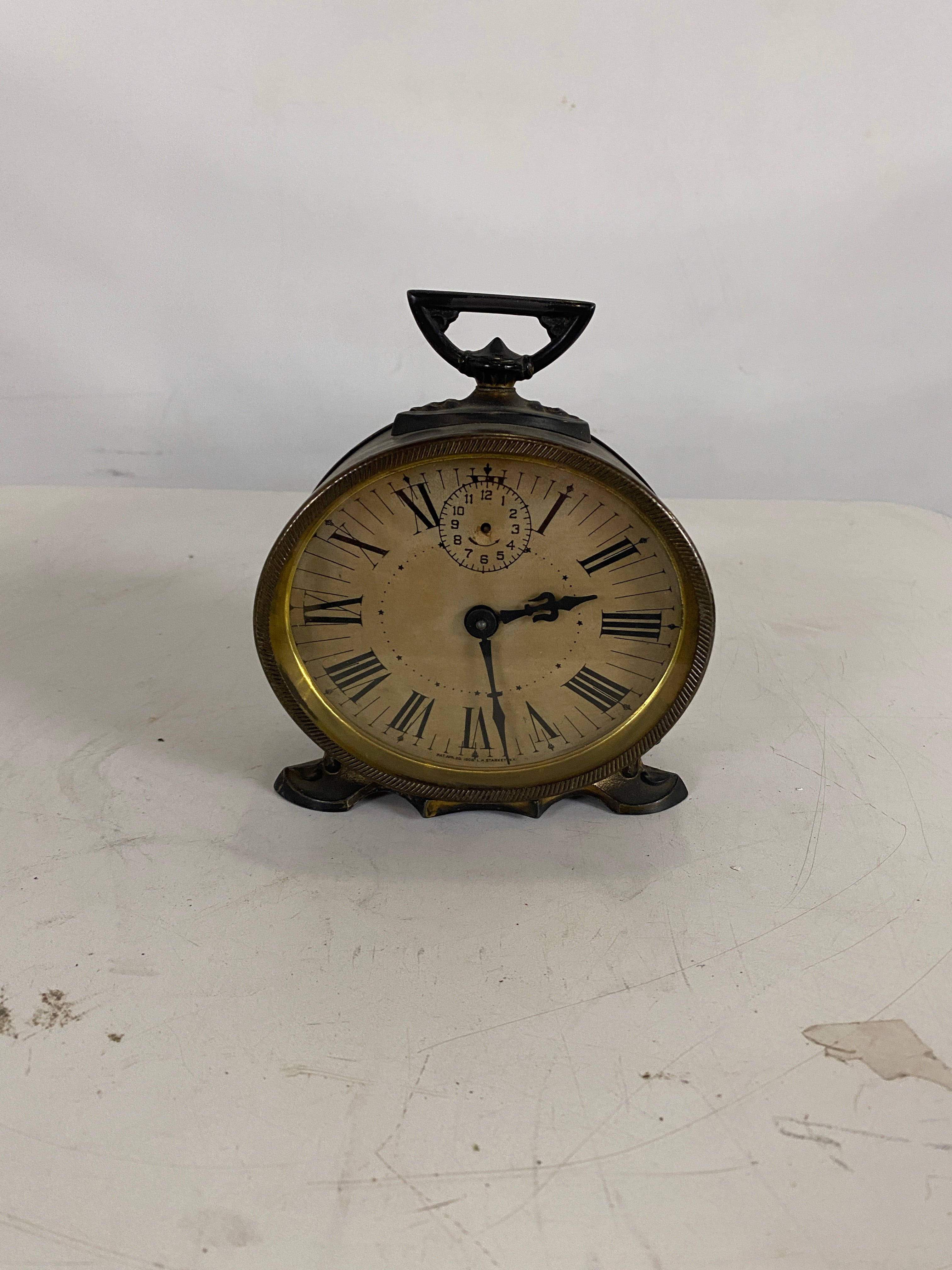 LH Starkey Oval Wind Up Alarm Clock