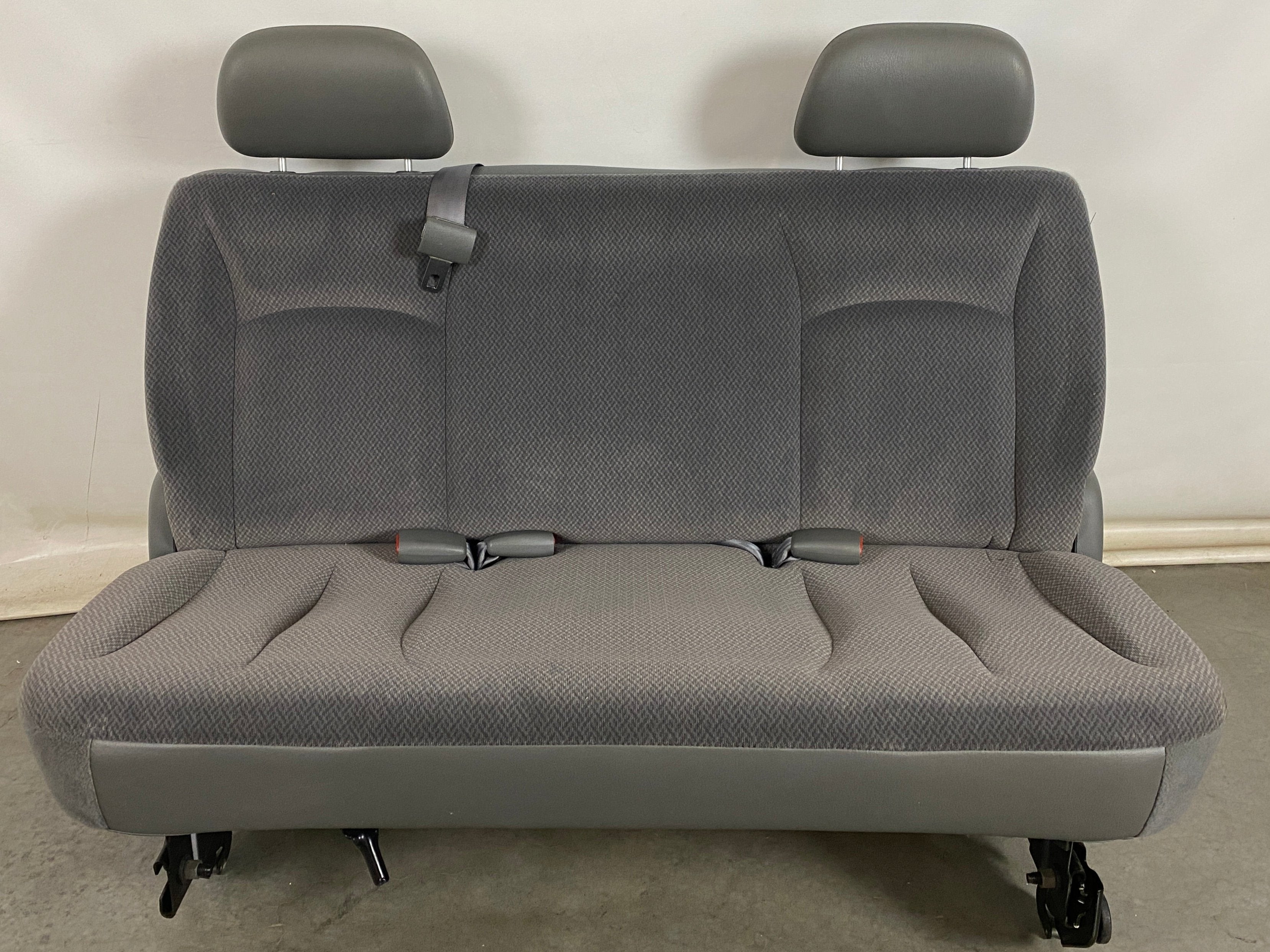 Gray Van Rear Seating with Seat Buckles