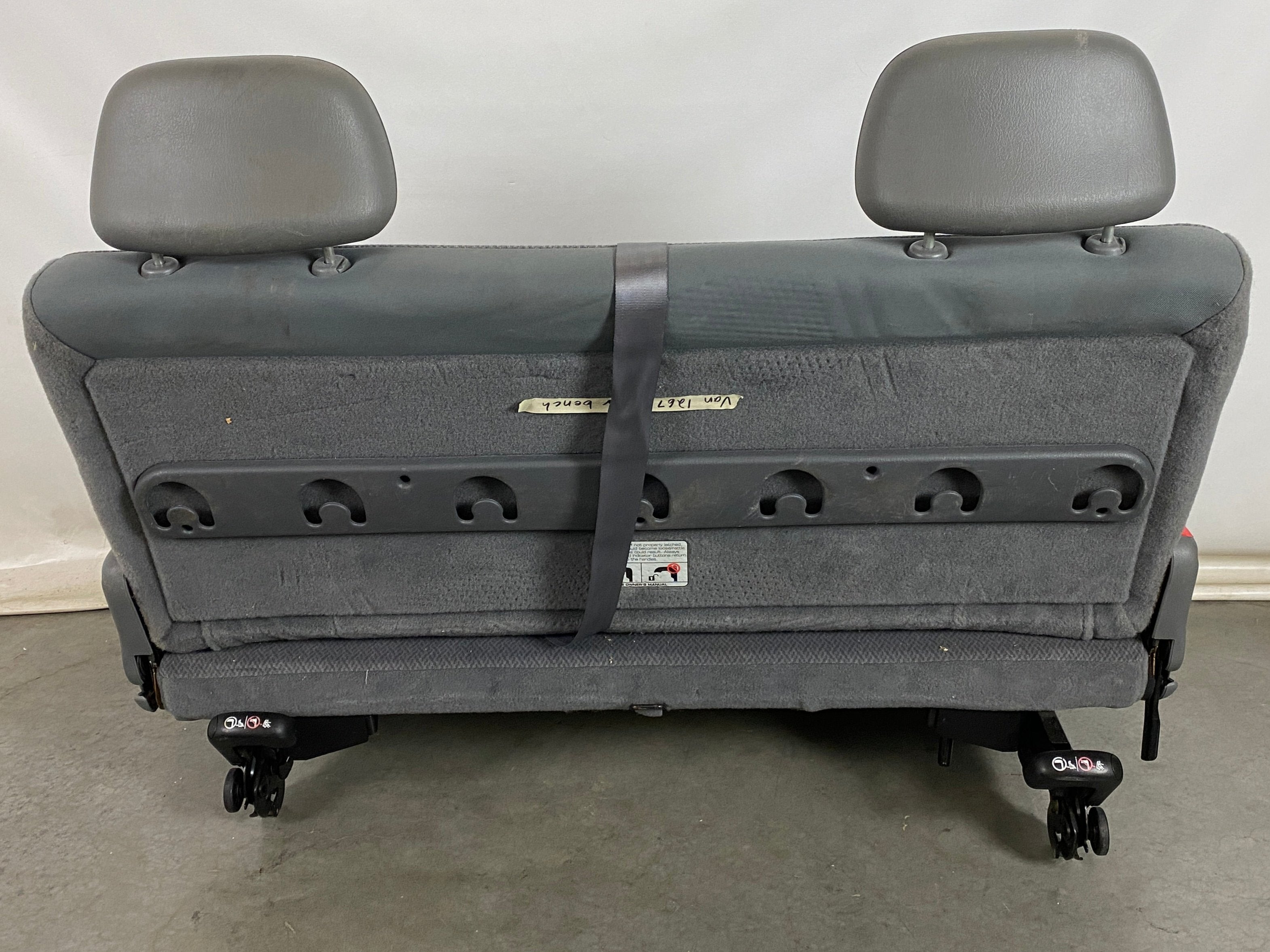 Gray Van Rear Seating with Seat Buckles