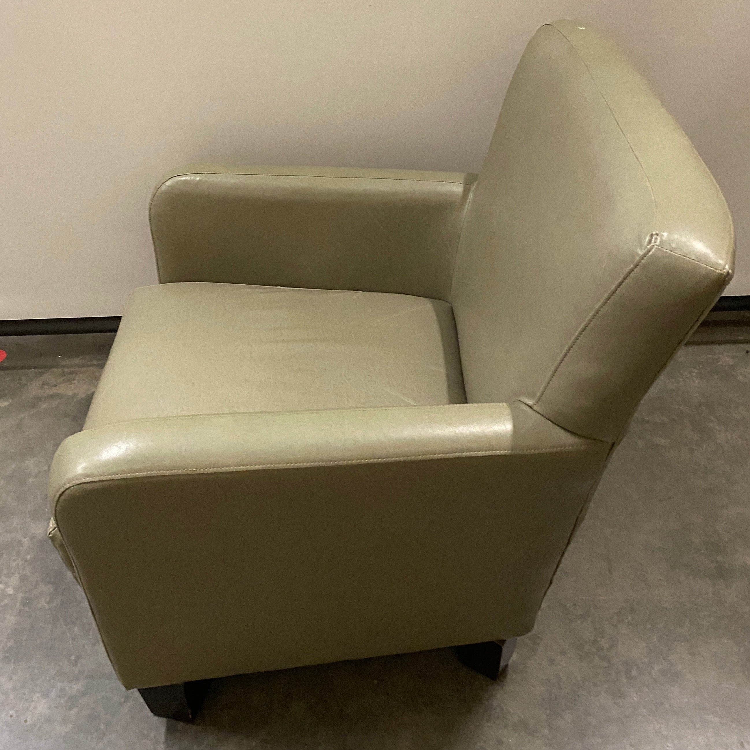 Green Upholstered Cushioned Chair