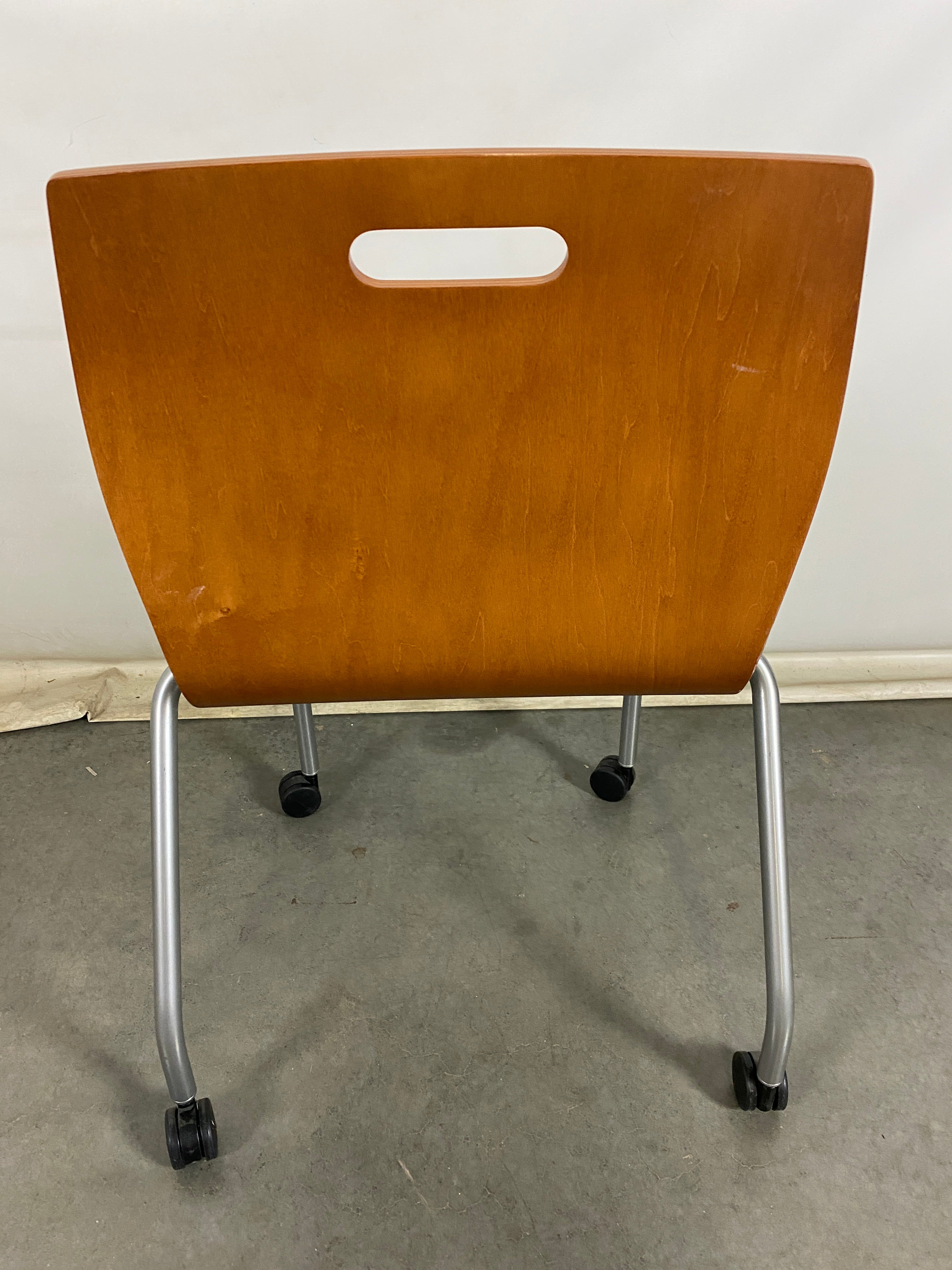 Metropolitan Furniture Corp. Wooden Rolling Chair with Brown Upholstered Seat