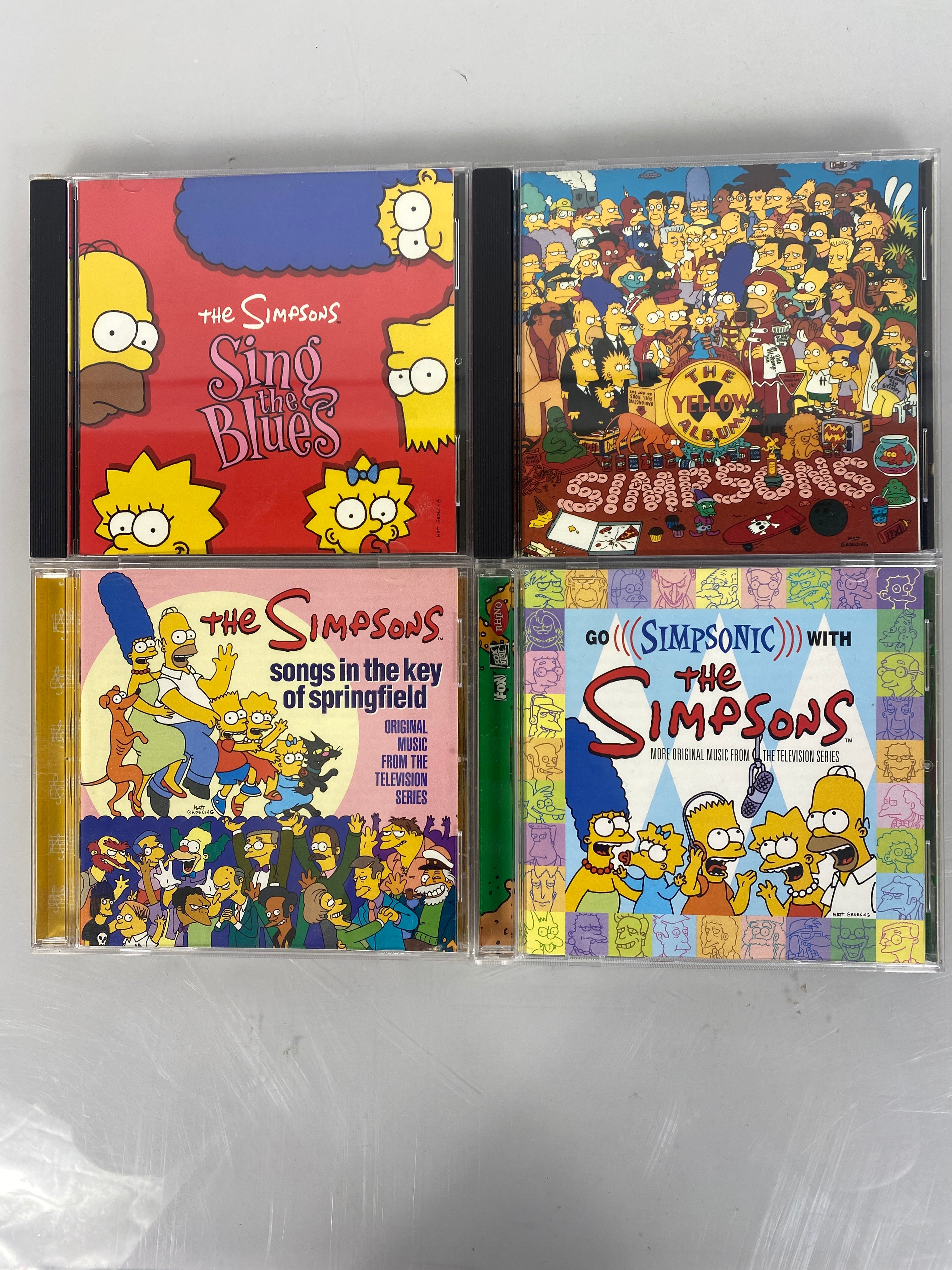 The Simpsons 4 CD Lot Yellow, Simpsonic, Sing the Blues, & Key of Springfield