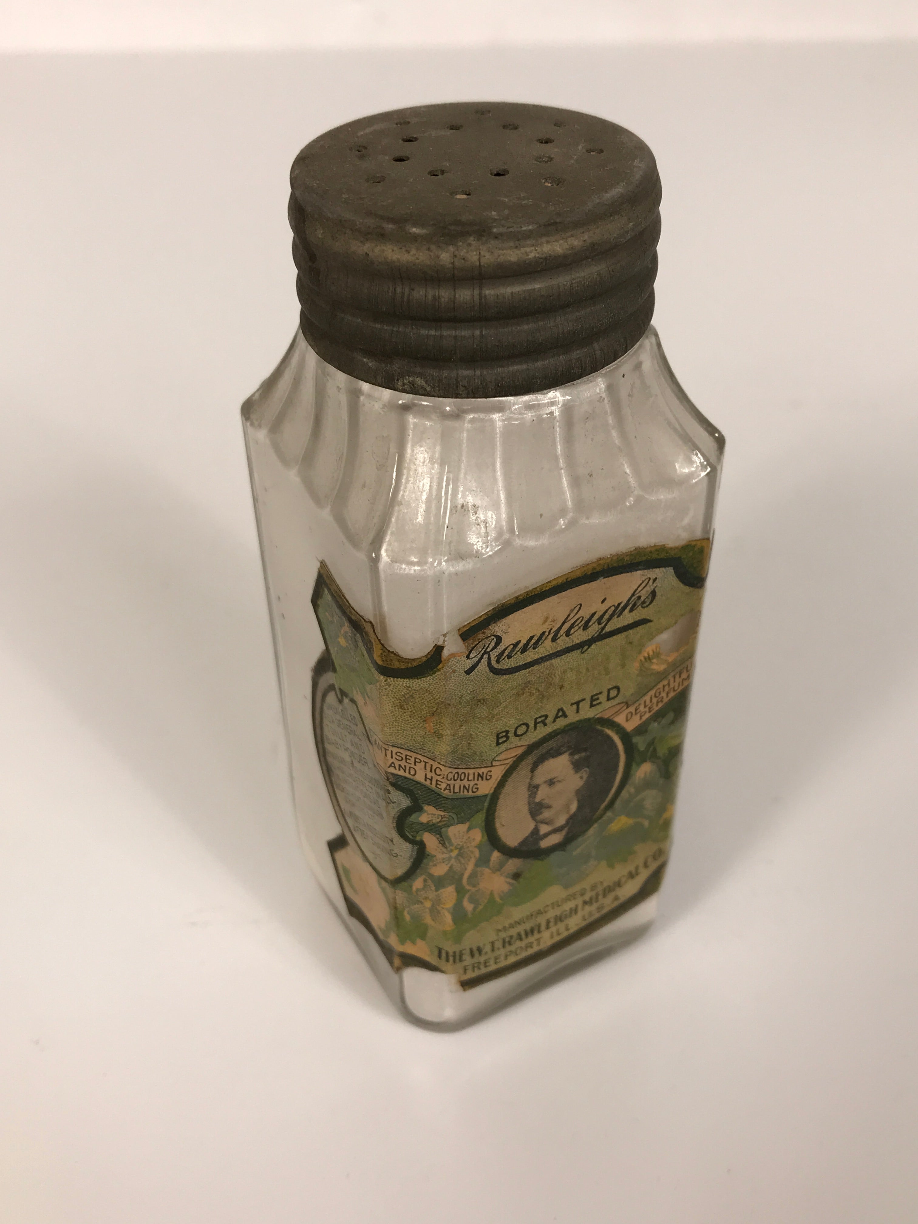 Antique Rawleigh's Toilet & Baby Powder Embossed Glass Bottle with Label