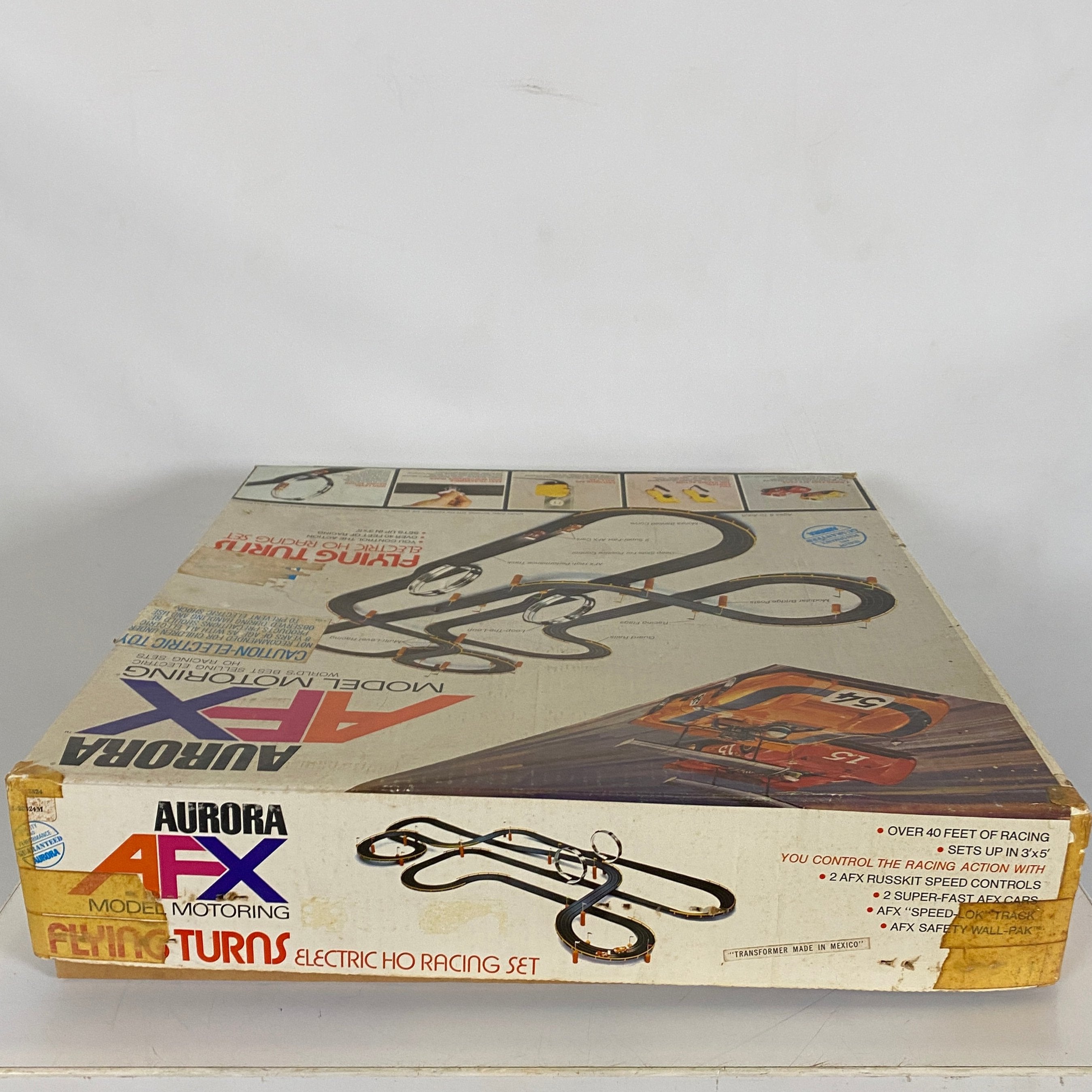 Aurora AFX Model Motoring #48-28324 Flying Turns Electric HO Racing Set