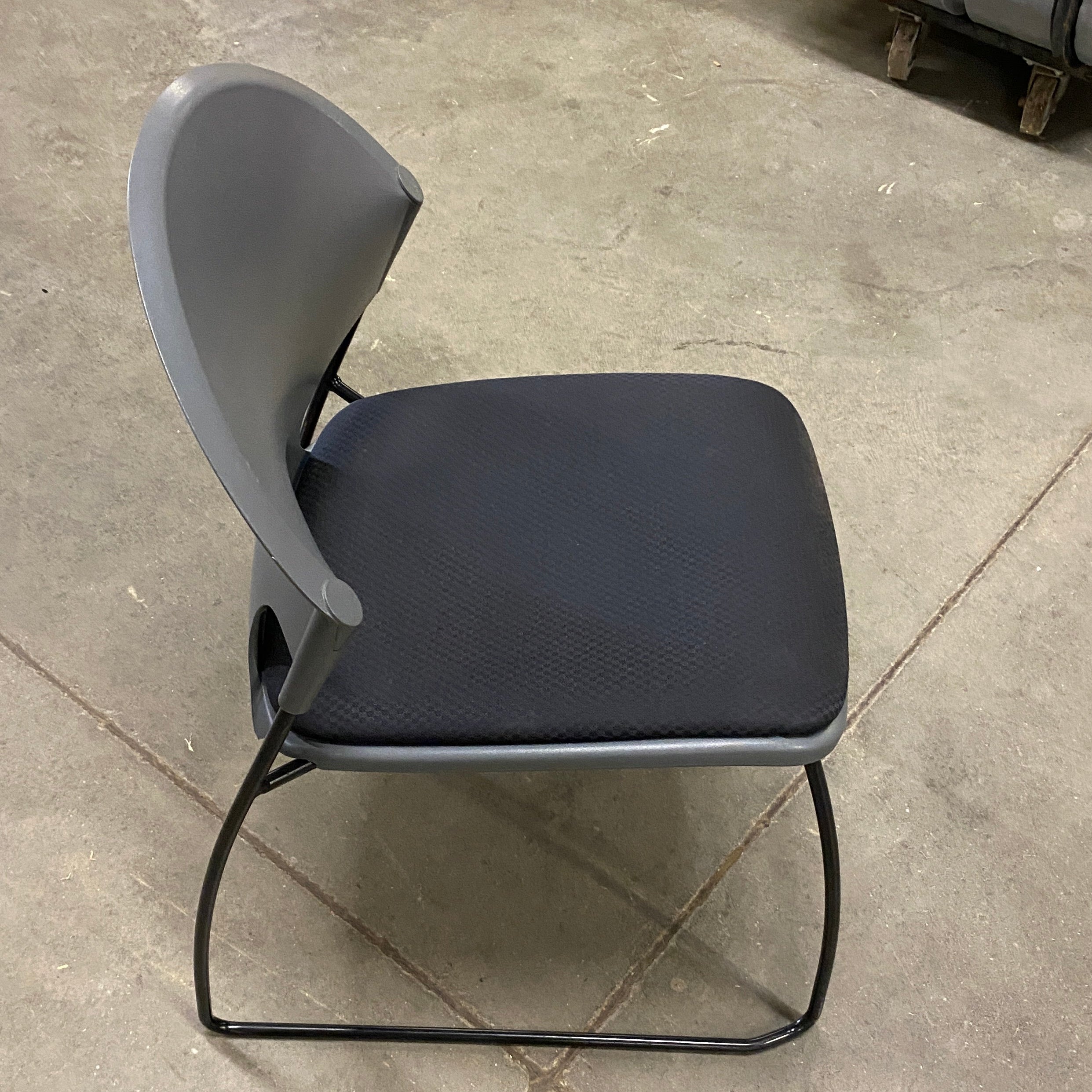 Grey Plastic Rounded Stackable Chair