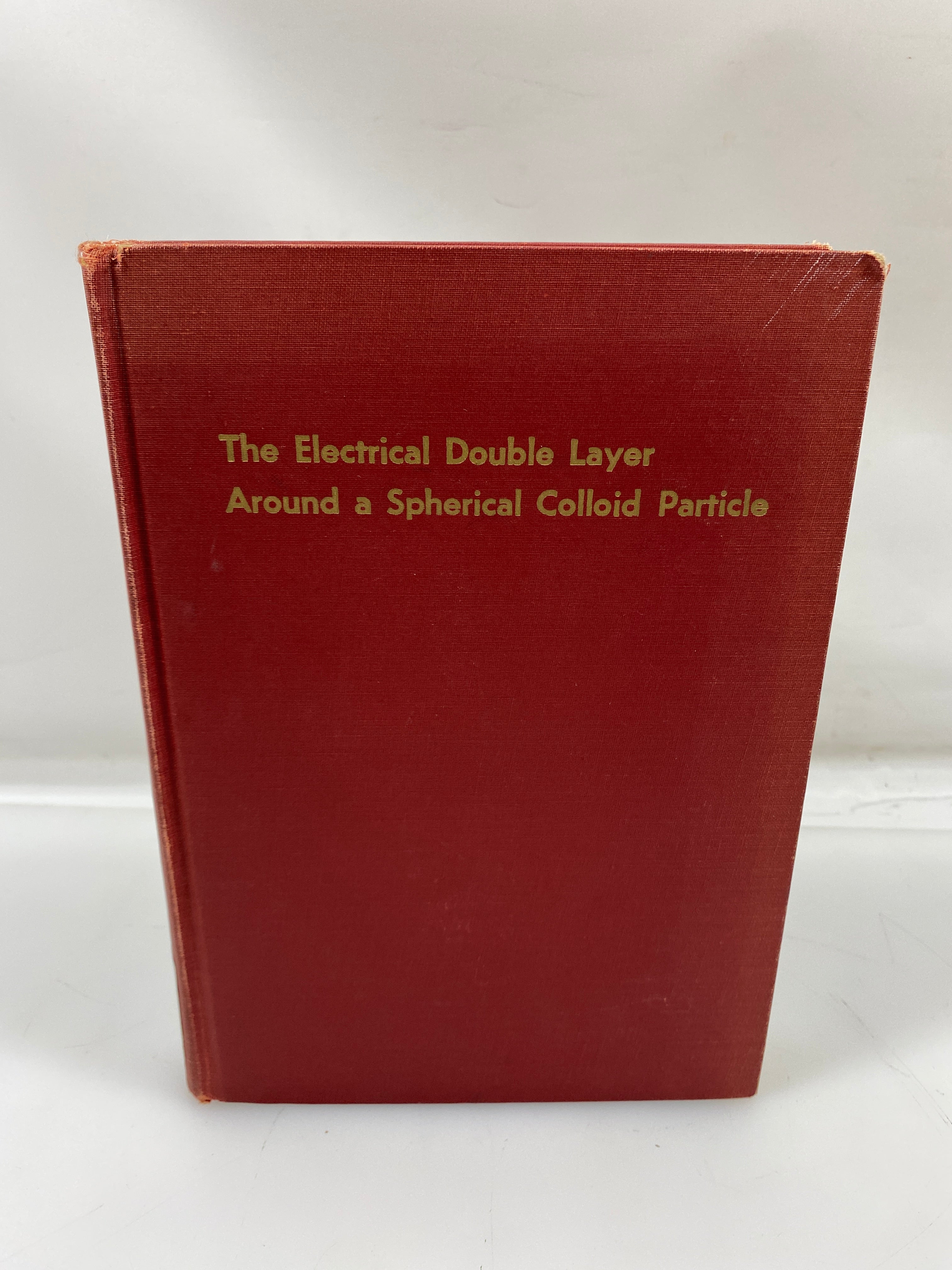 The Electrical Double Layer Around a Spherical Colloid Particle Ex-Library 1961