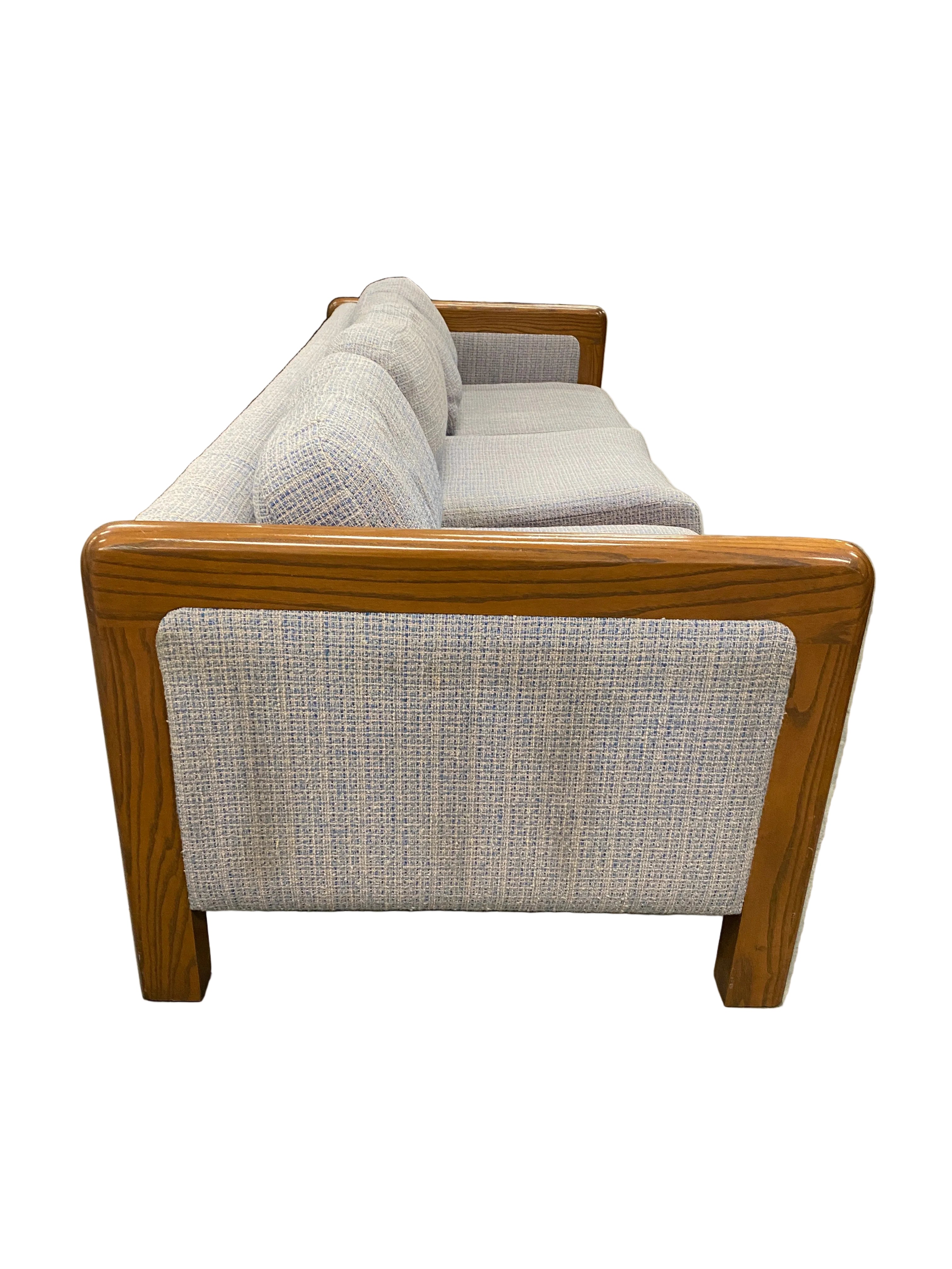 Wooden Frame Couch With Creme Upholstery