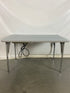 Gray Laminate Table With Power Strip