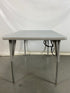 Gray Laminate Table With Power Strip