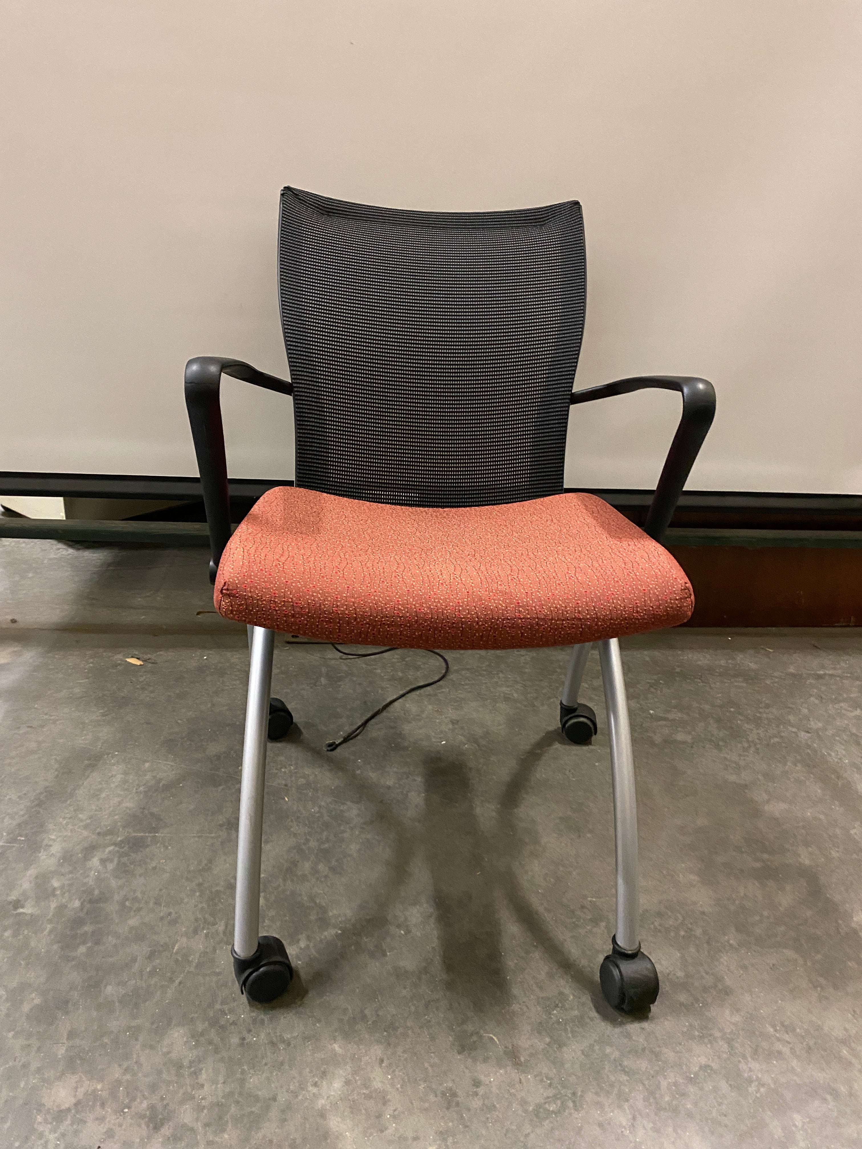Red Mesh Backed Chair On Wheels