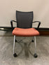 Red Mesh Backed Chair On Wheels