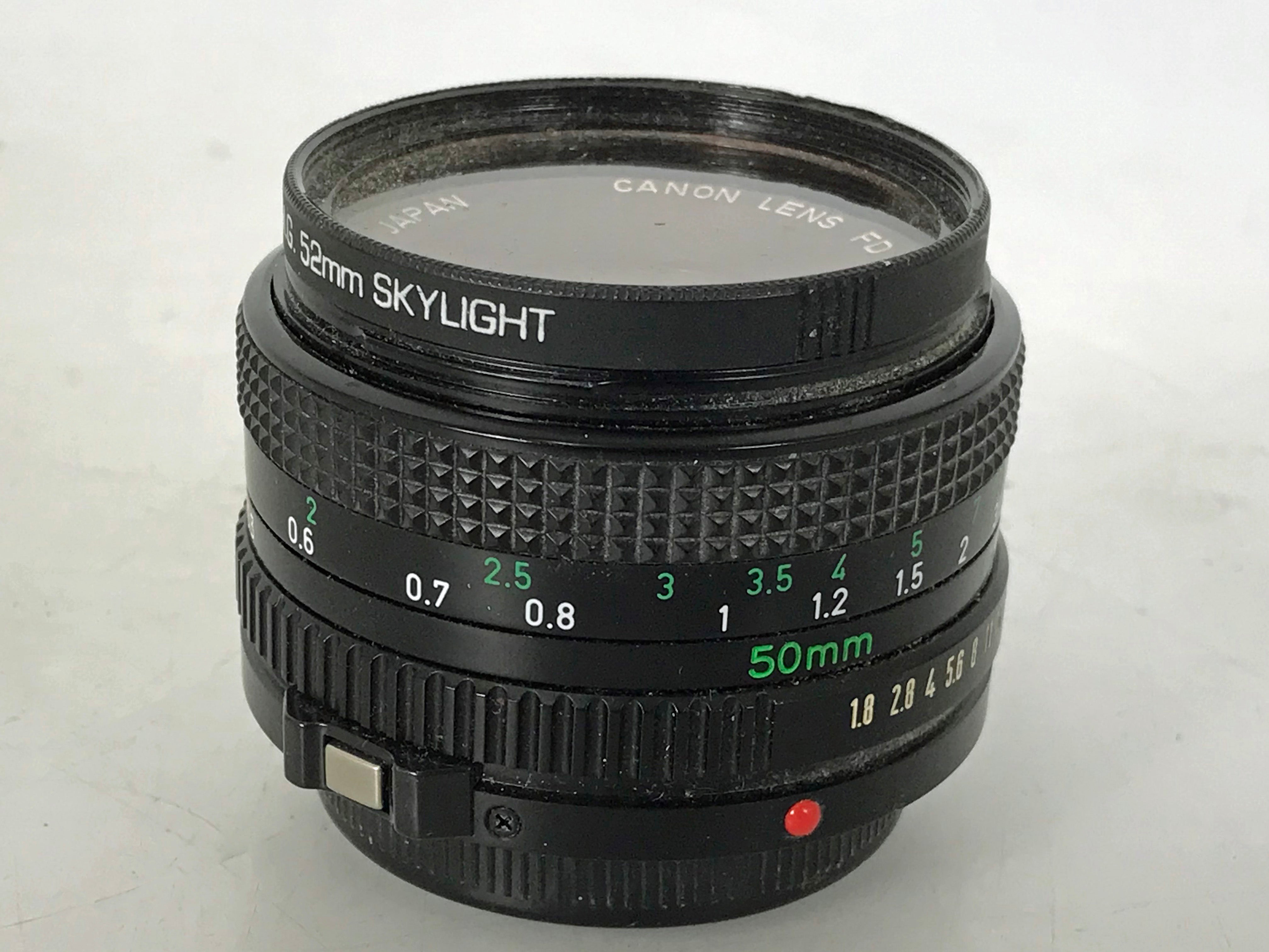 Canon Lens FD 50mm 1:1.8 Lens w/ Rolev MG 52mm Skylight Filter