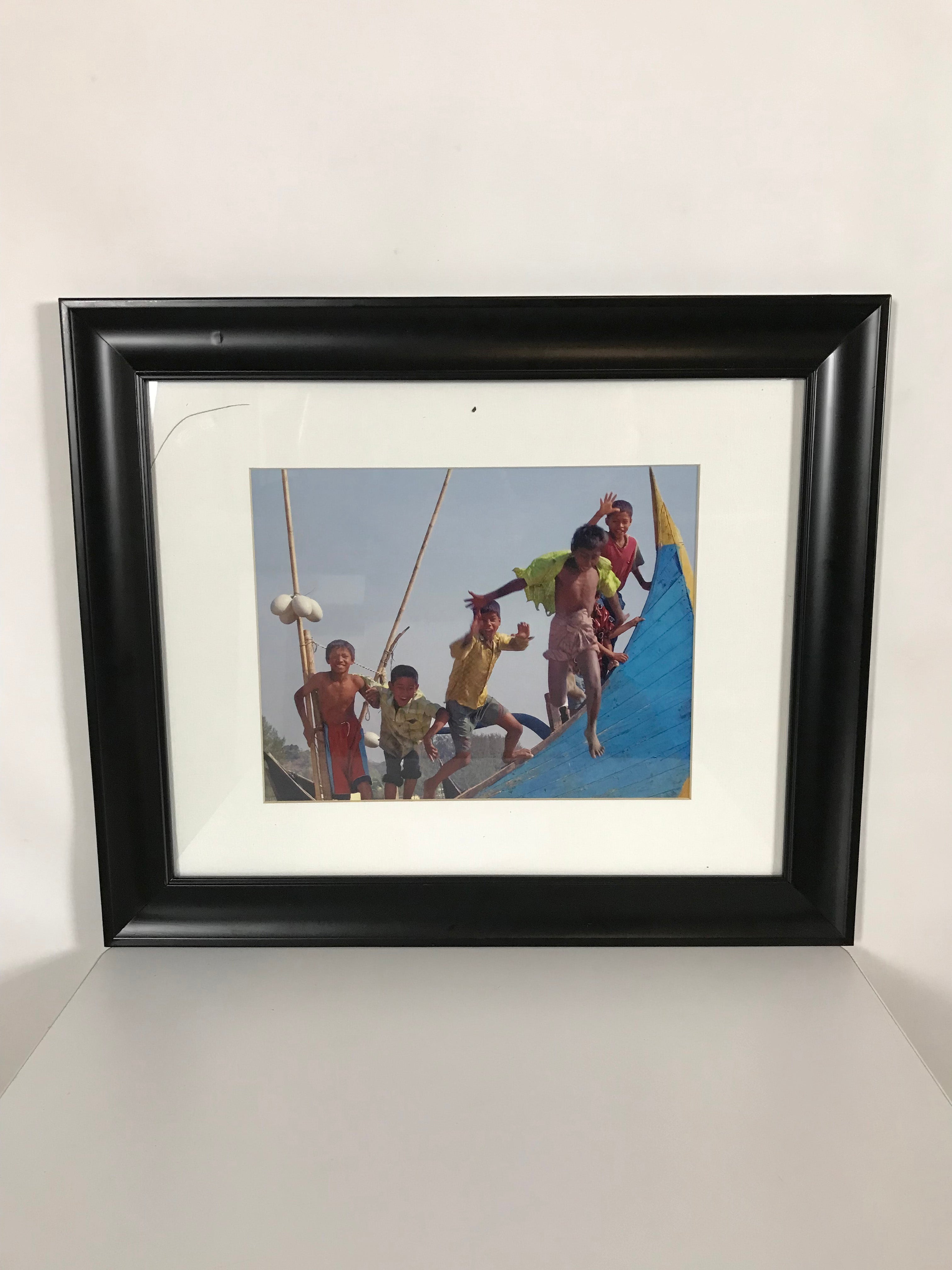 24x20 Framed Picture of Kids Jumping Off Boat in Bangladesh