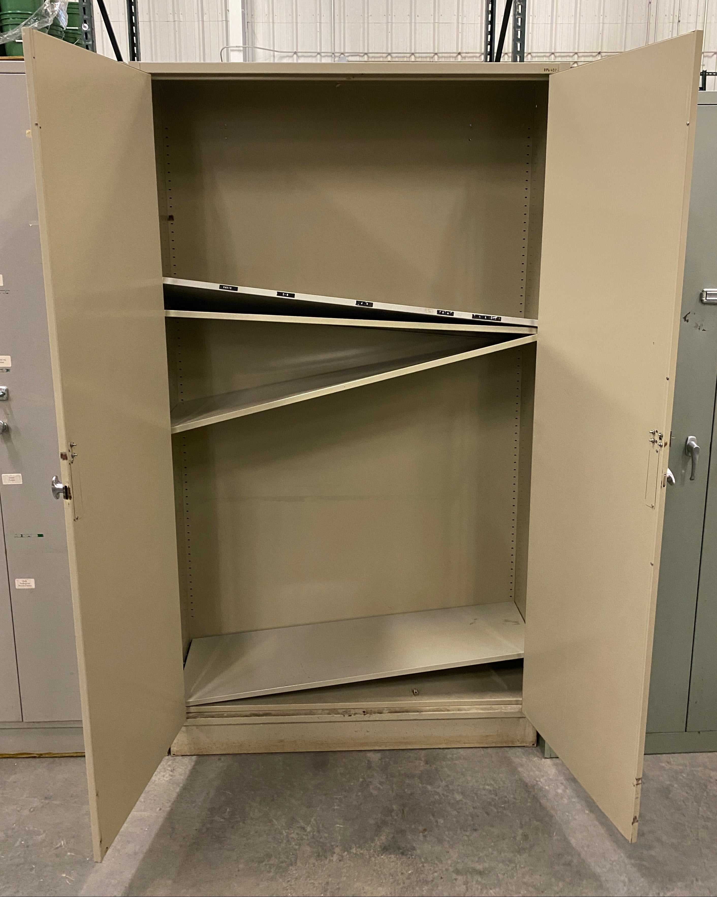 Tan 2 Door Cabinet w/ Adjustable Shelves