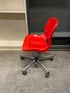 Red Plastic Chair on Wheels