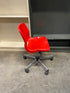 Red Plastic Chair on Wheels