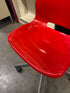 Red Plastic Chair on Wheels