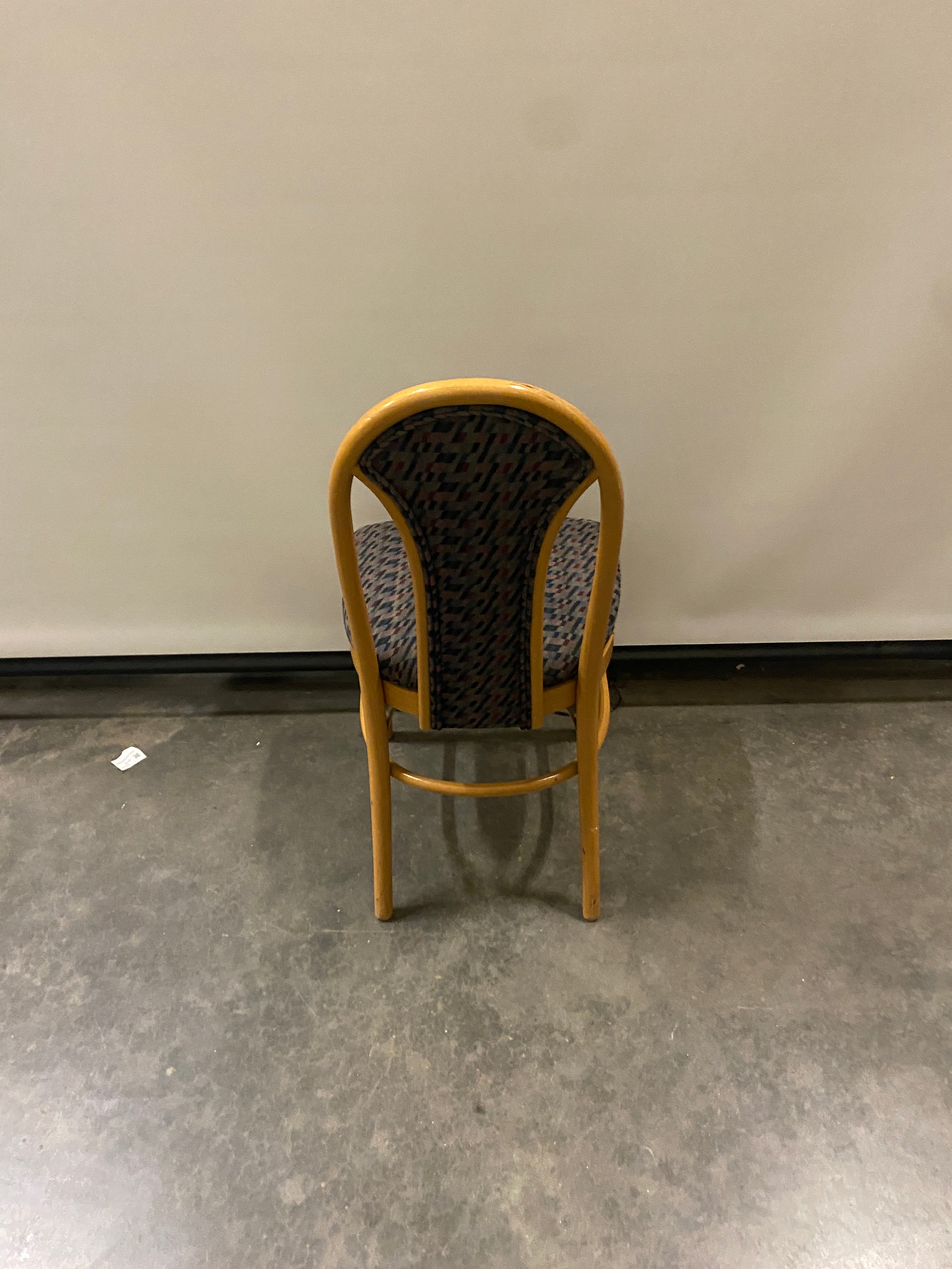 Blue Geometric Patterned Chair with a Wooden Frame