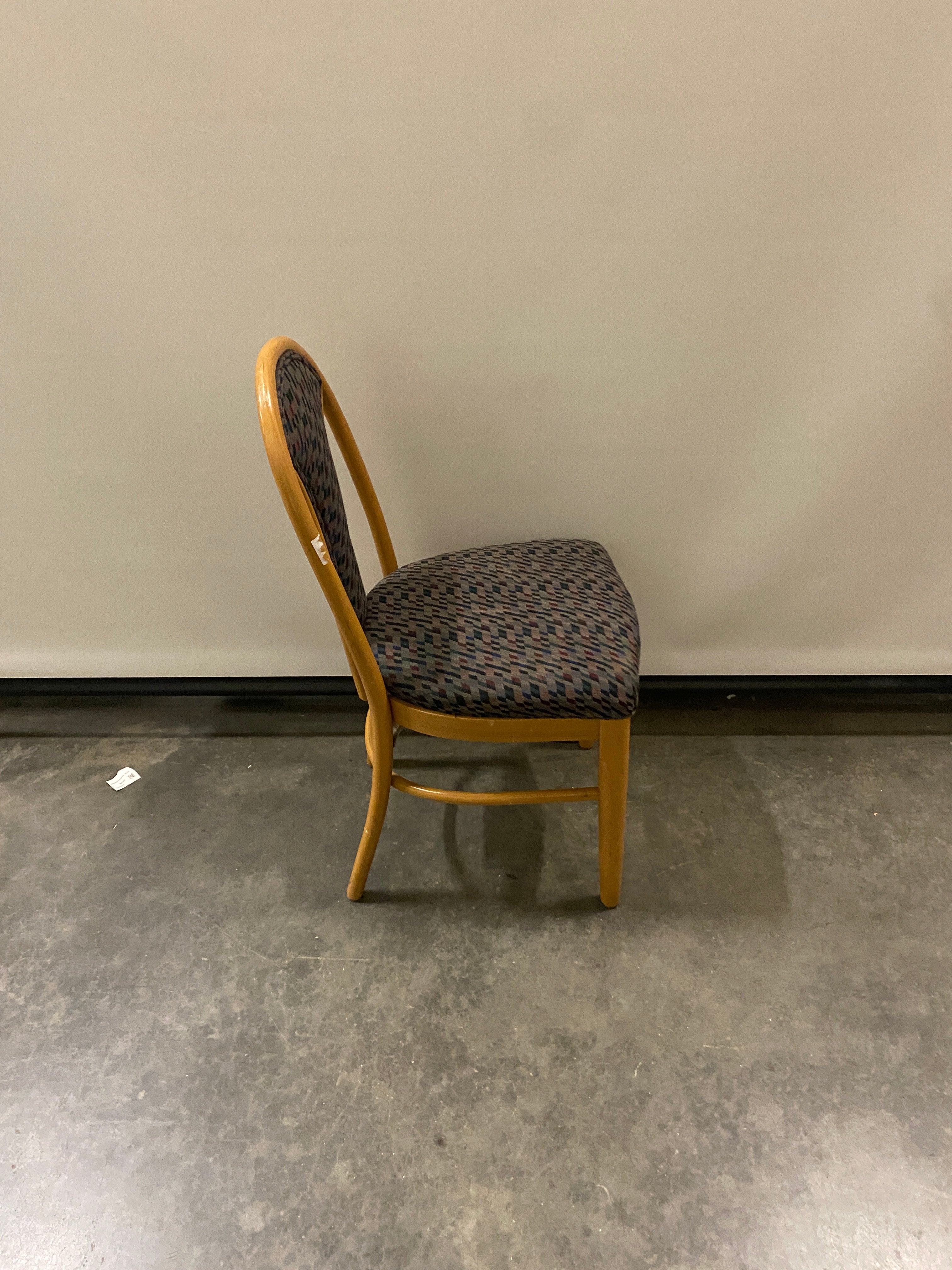 Blue Geometric Patterned Chair with a Wooden Frame