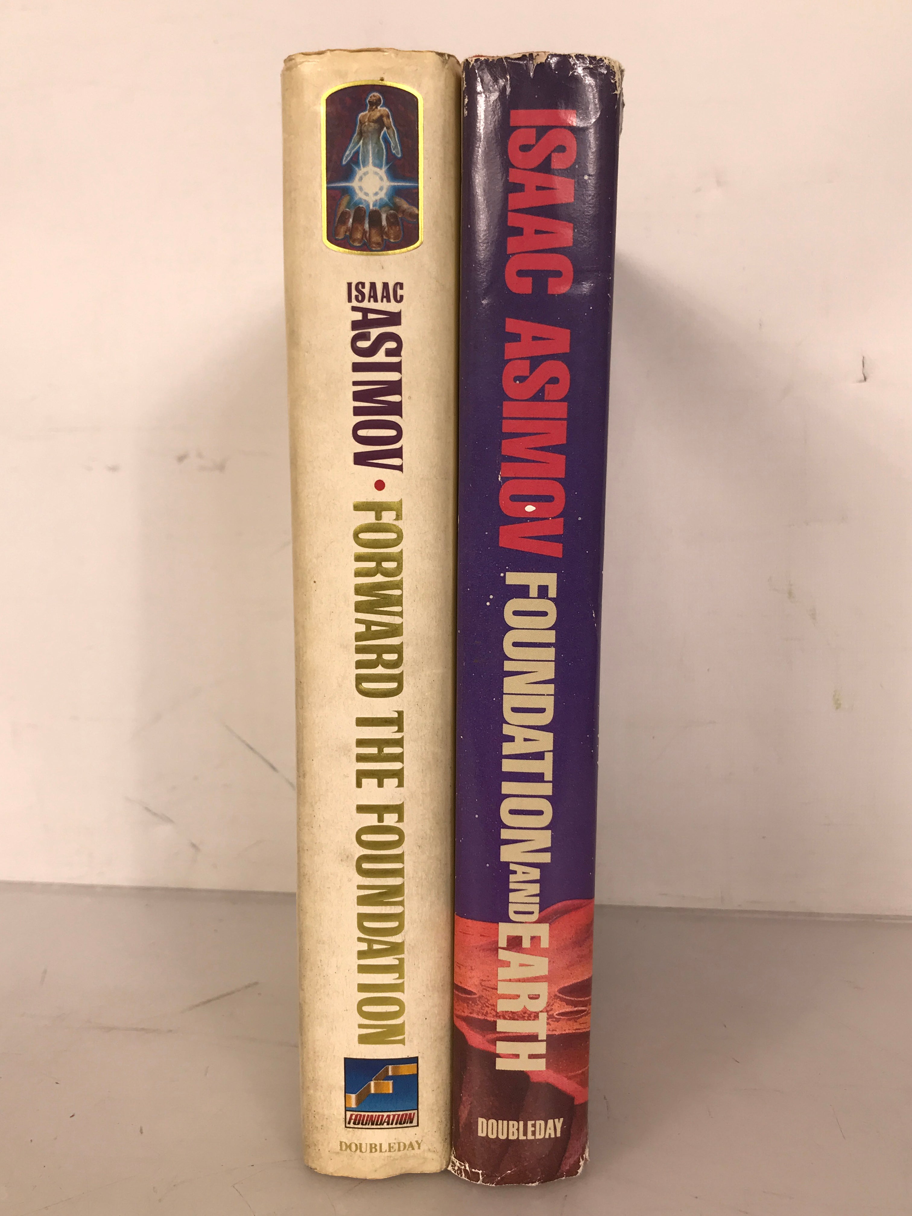 Lot of 2 Isaac Asimov: Foundation and Earth (1986 First Edition) and Forward the Foundation (1993) HC DJ