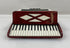 Miniature Red and White Accordion