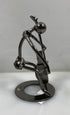 Silver Nuts and Bolts Cellist Metal Figurine With Ring Base