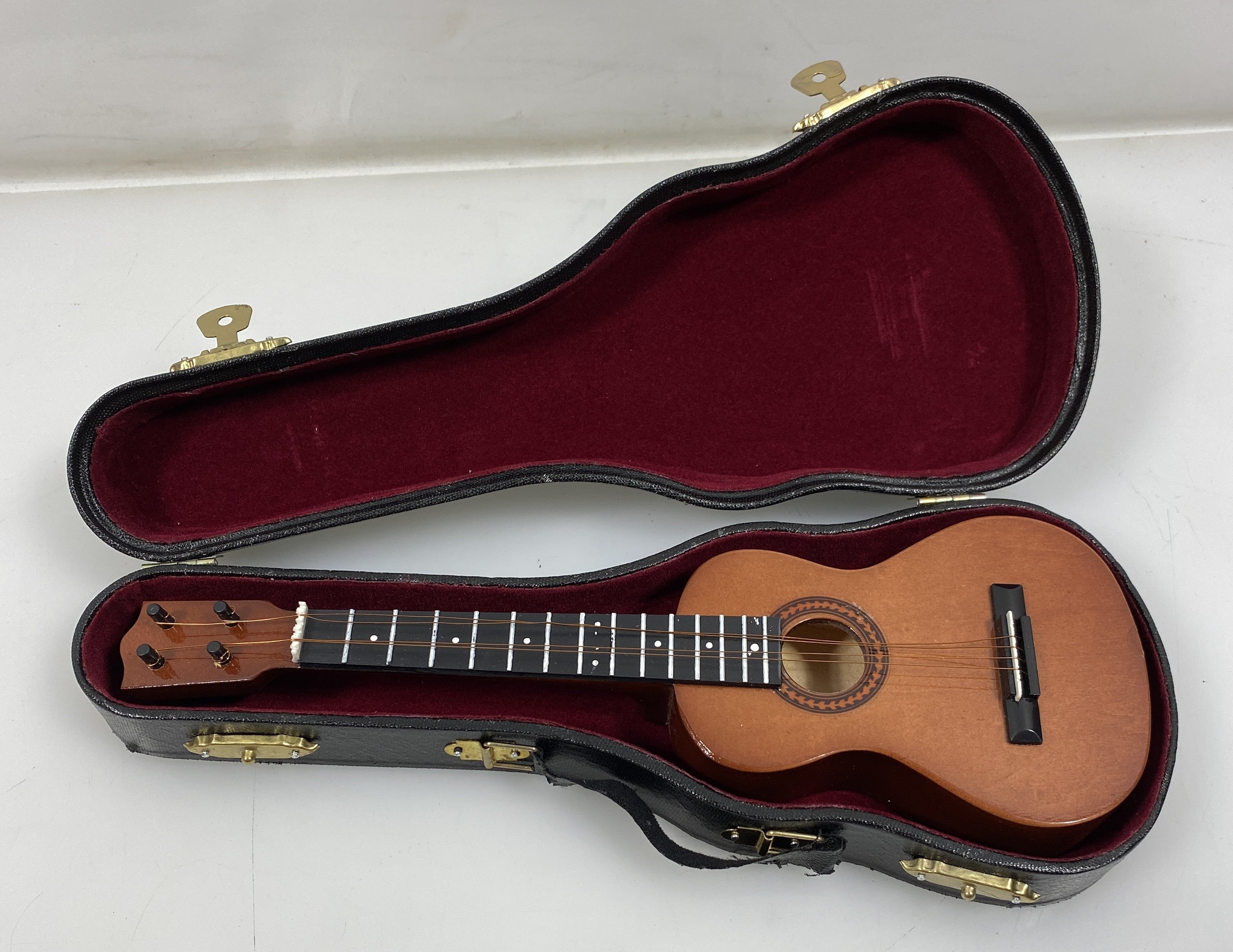Miniature Brown Ukulele With Case