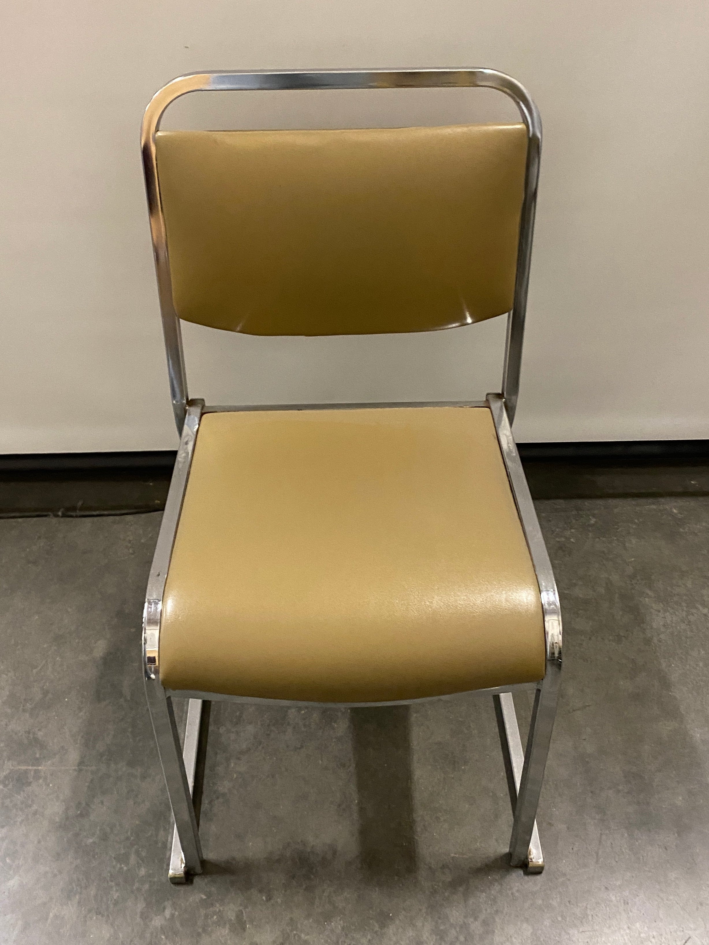 Beige Cushioned Metal Framed Stackable Chair