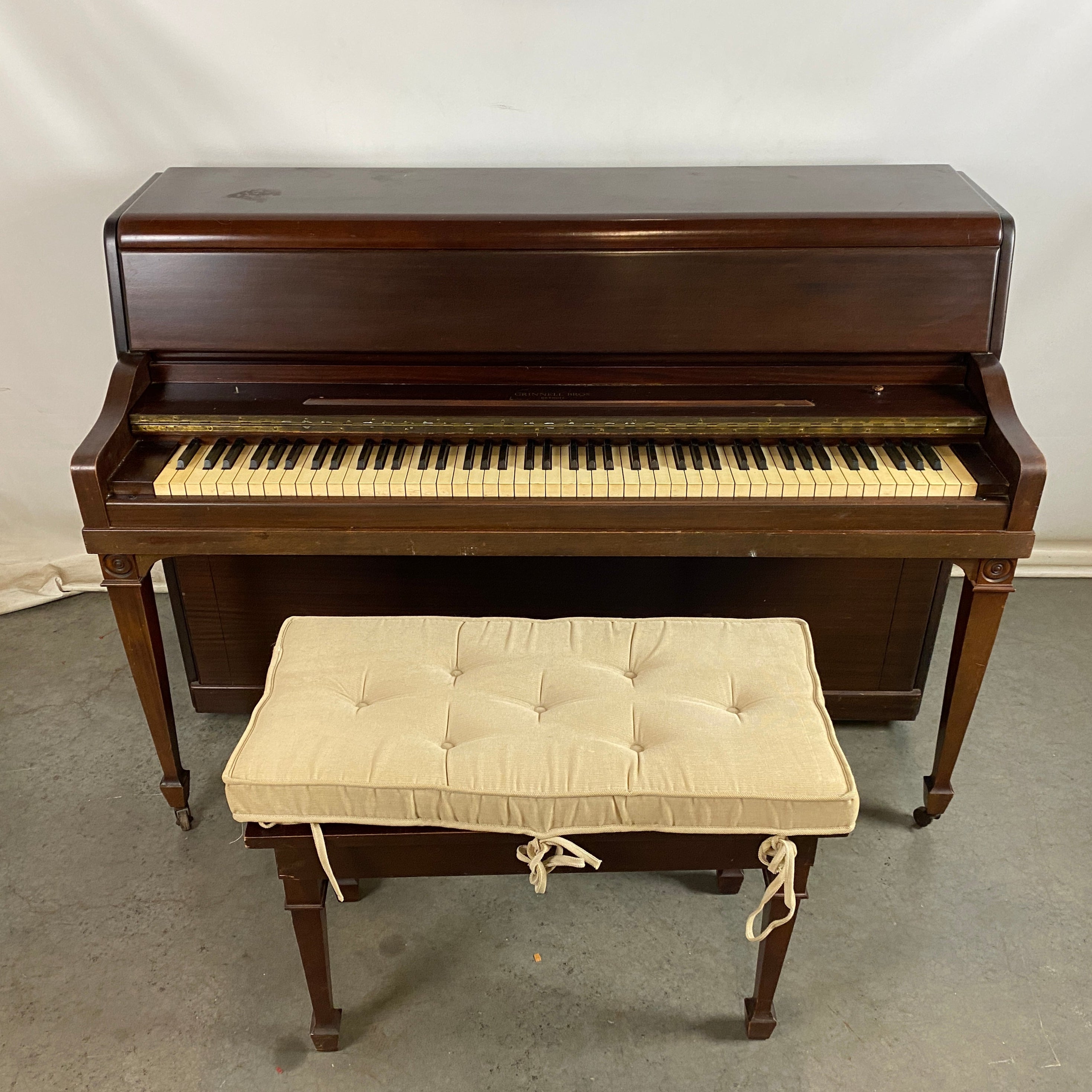 Grinnell Bros Dark Wood Piano w/ Seat