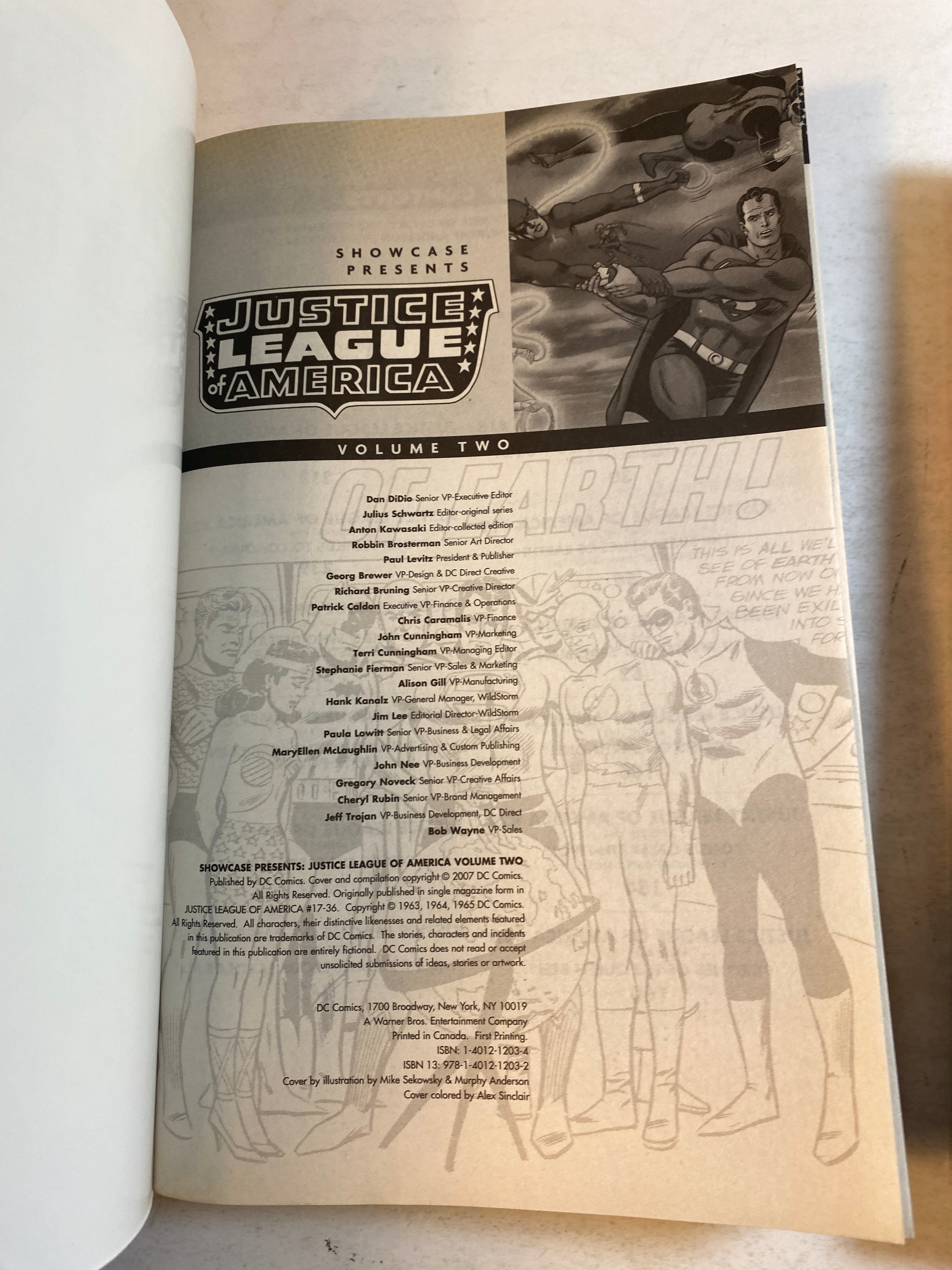 Lot of 2 DC Comics Showcase Justice League American Vols 1 and 2 2005-2007
