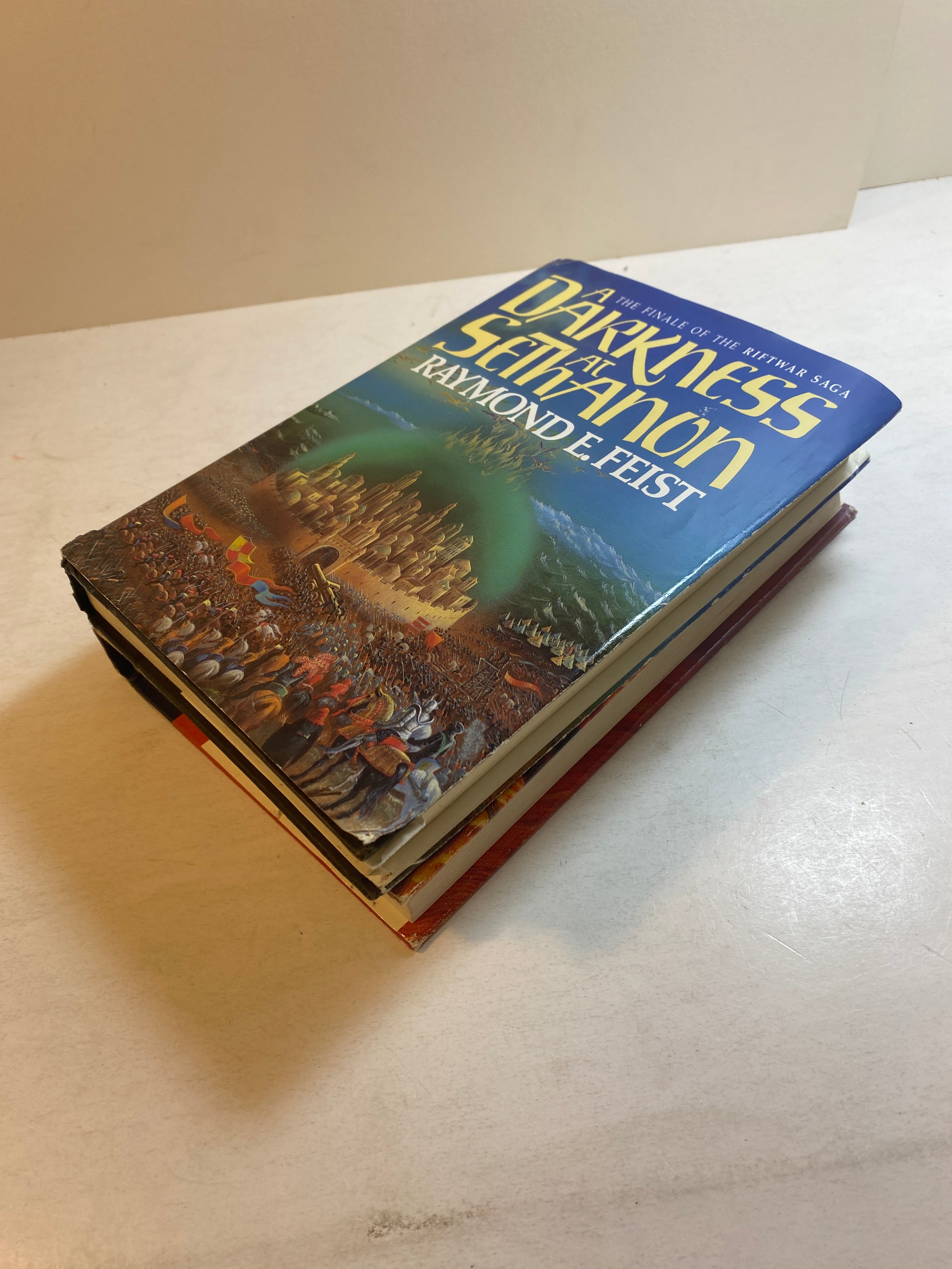 Lot of 2 Raymond Feist HCDJ Books 1986-1989