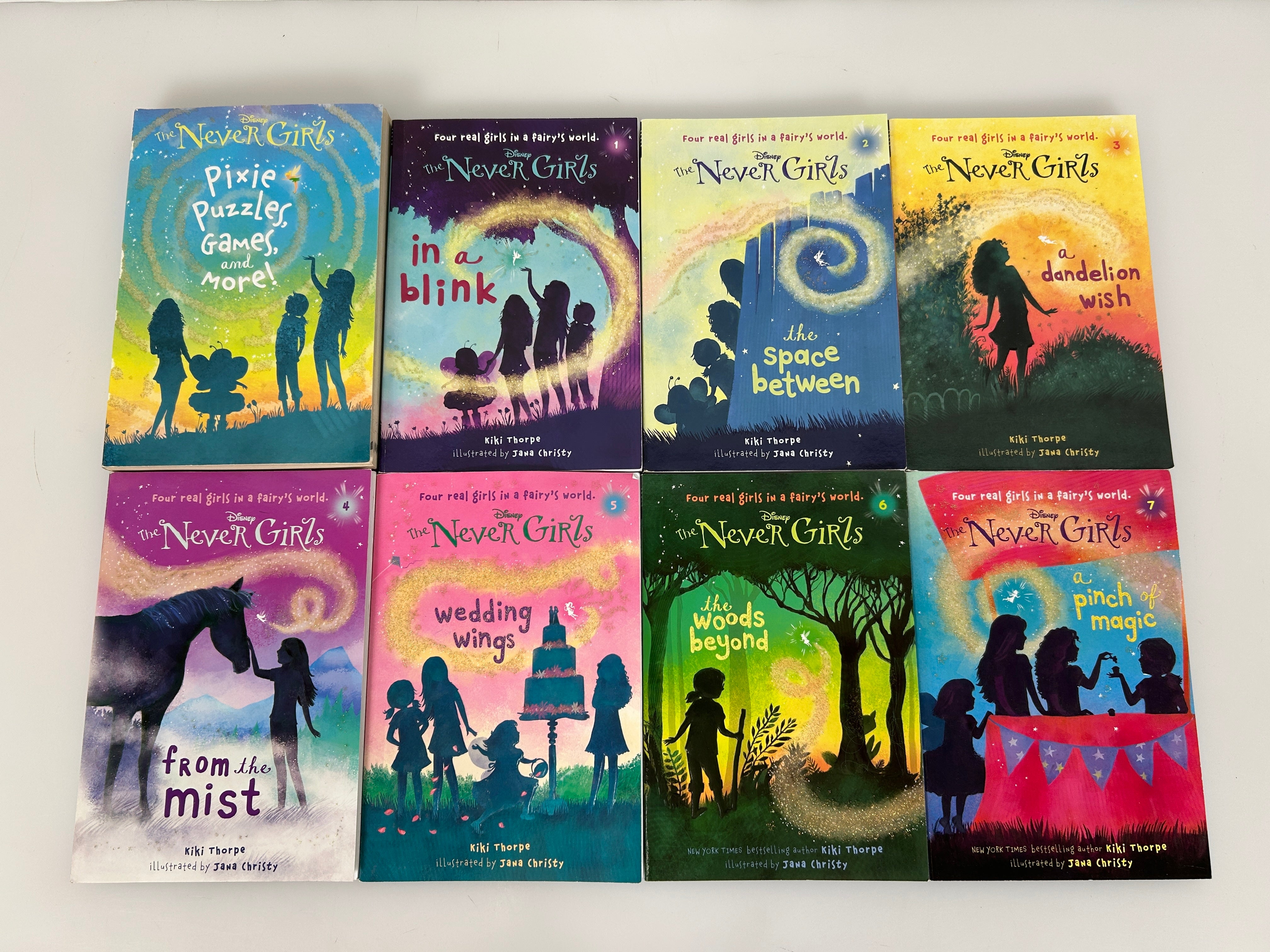Lot of 8 Disney The Never Girls Series - 1-7 + Pixie Puzzles, Games and More SC