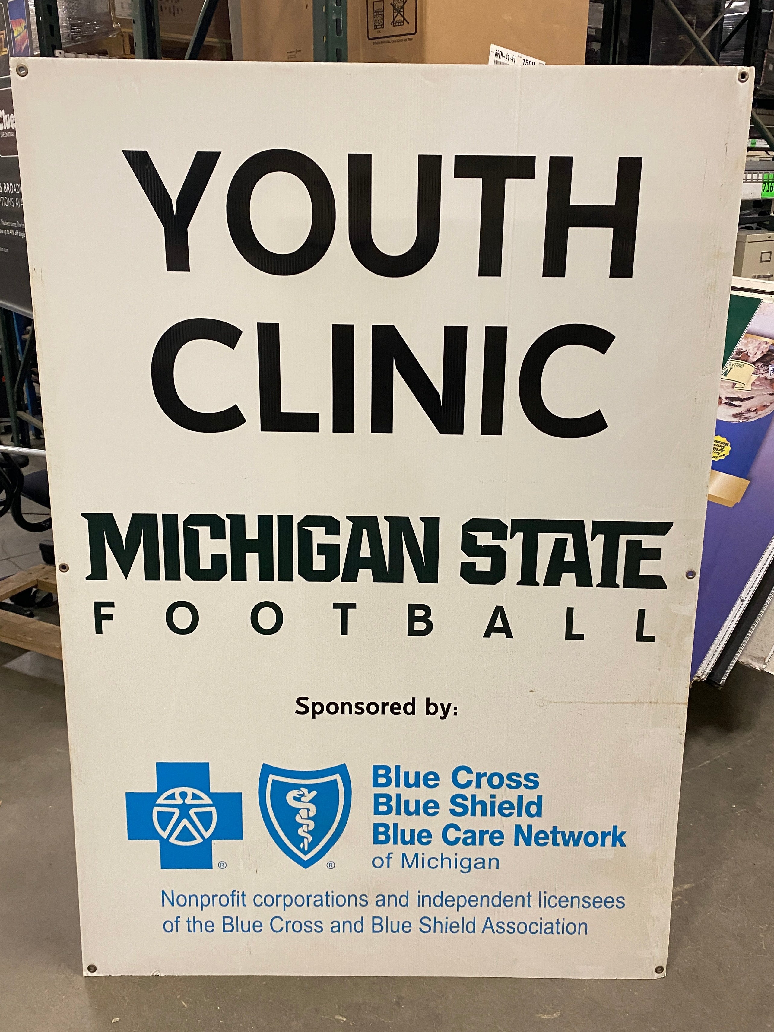Michigan State Football "Youth Clinic" "Blue Cross Blue Shield" Canvas Sign
