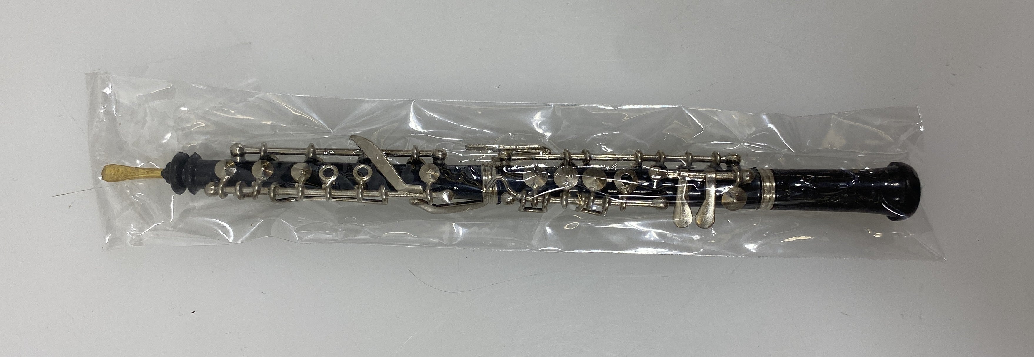 Miniature Black Oboe With Case And Stand