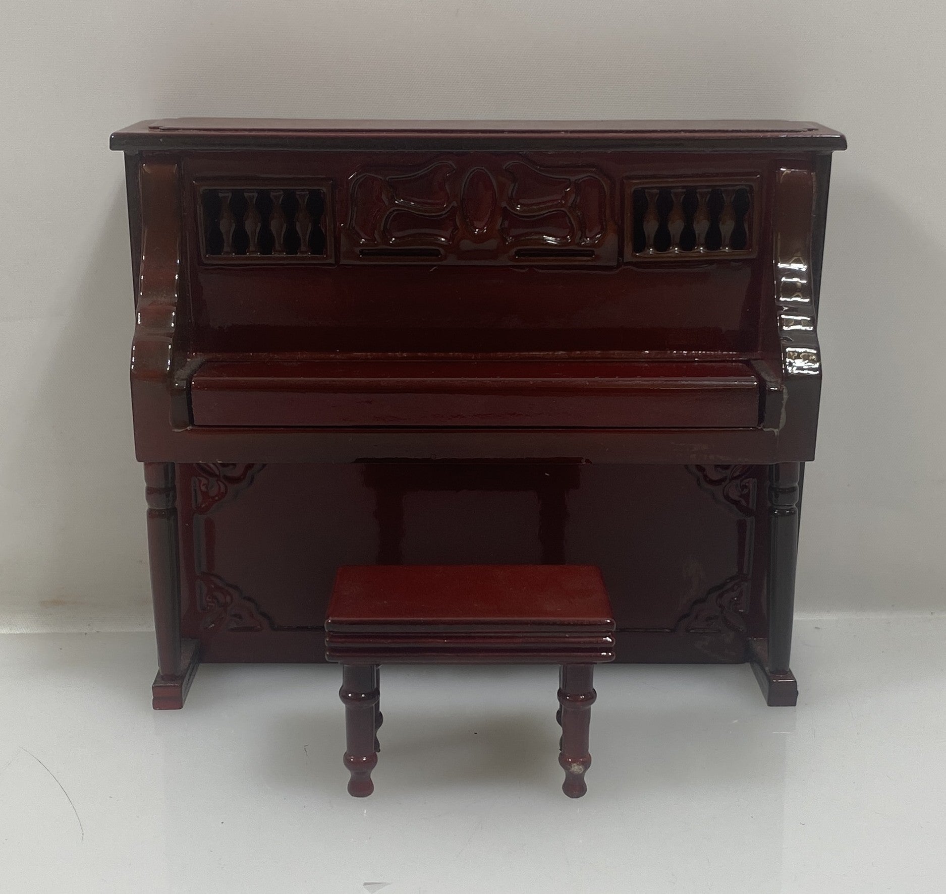 Miniature Brownish Red Upright Piano With Case
