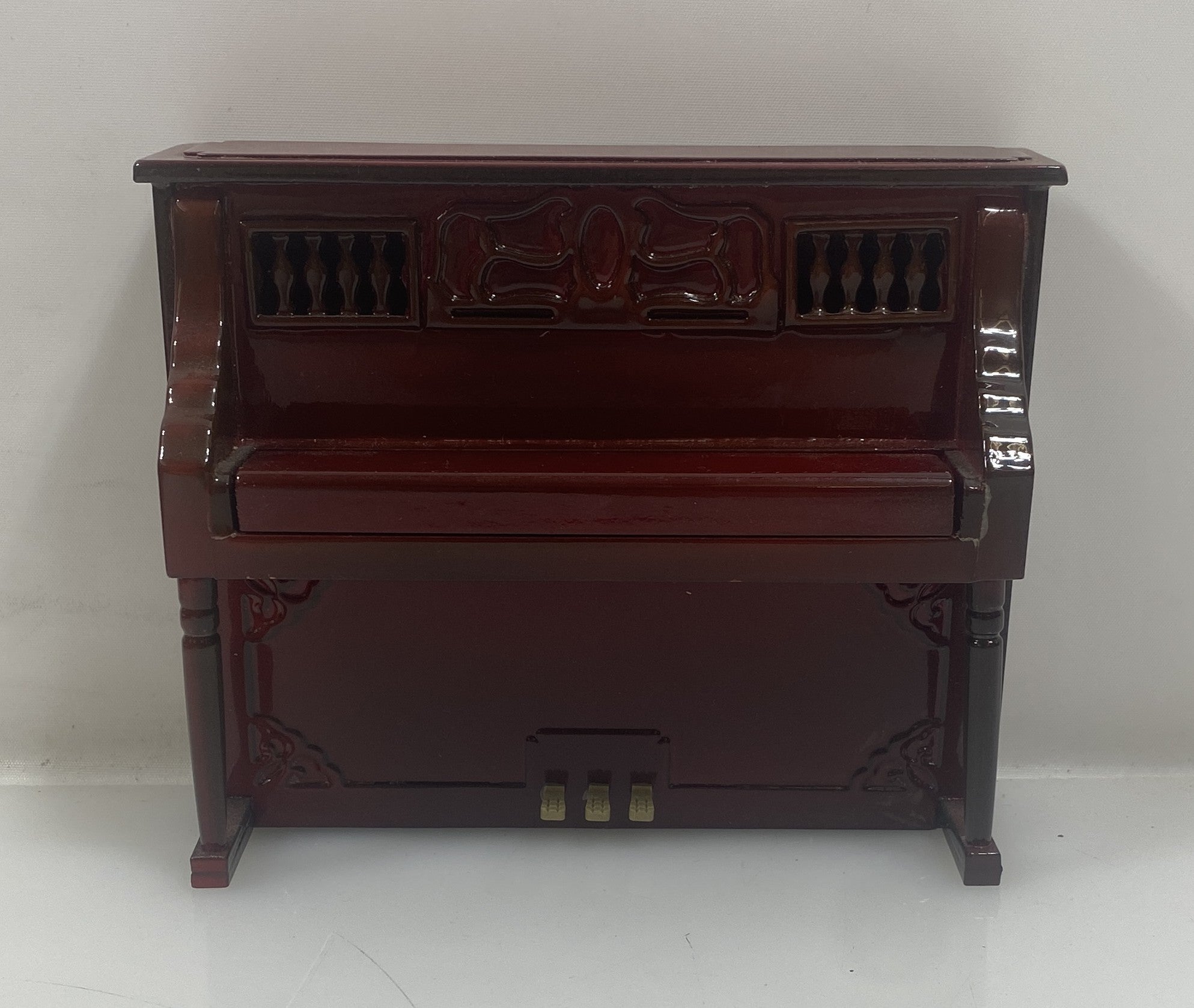 Miniature Brownish Red Upright Piano With Case
