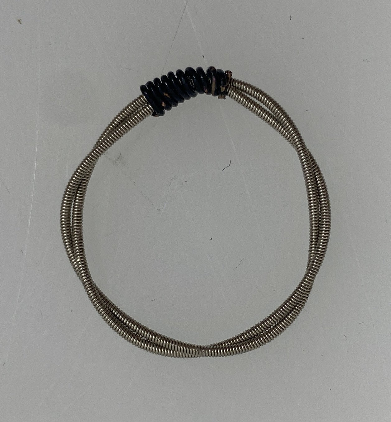 Restrung Metallic Black and Silver Spring Wire Ring