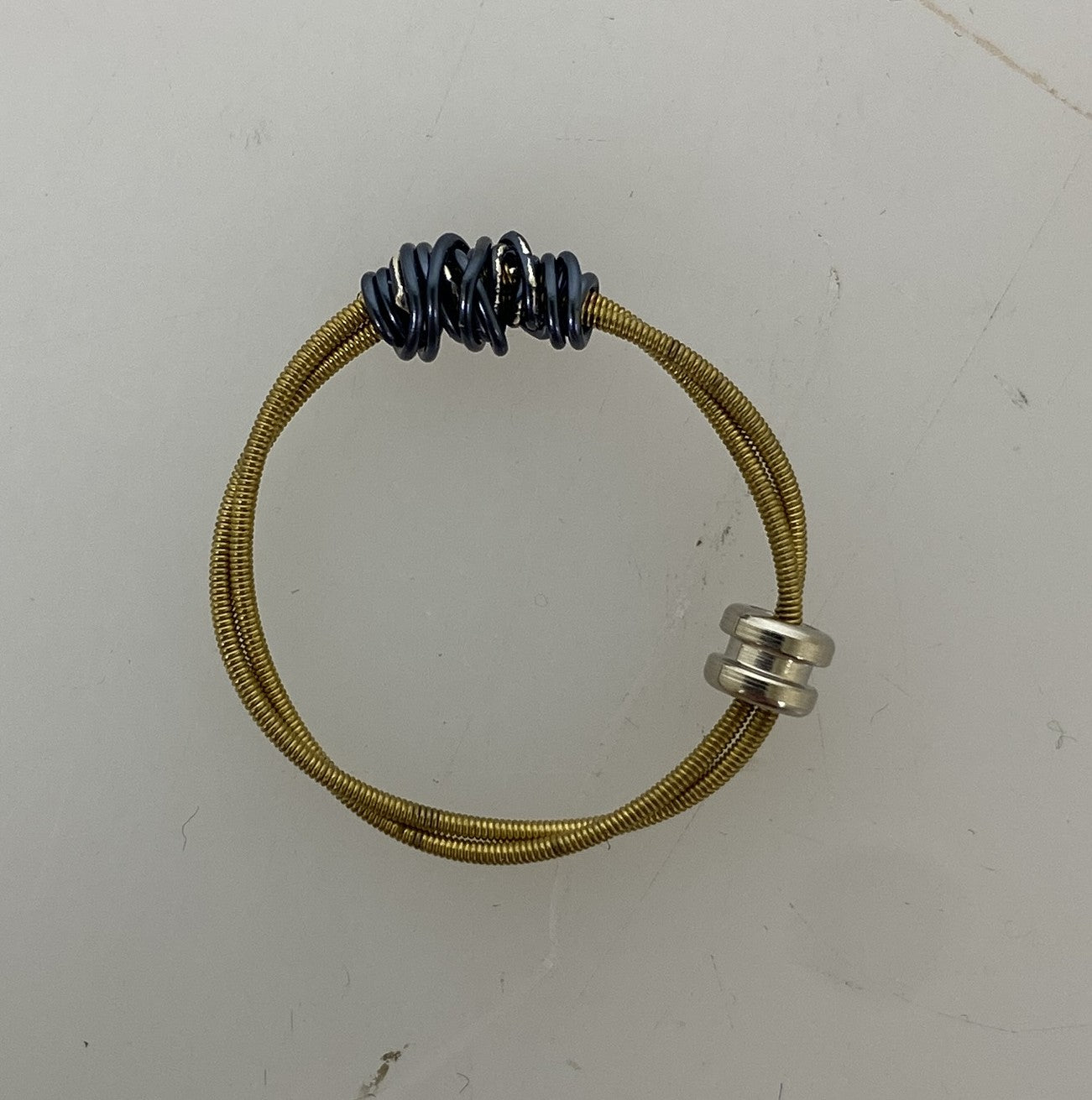Restrung Metallic Blue and Brass Spring Wire Bead Ring