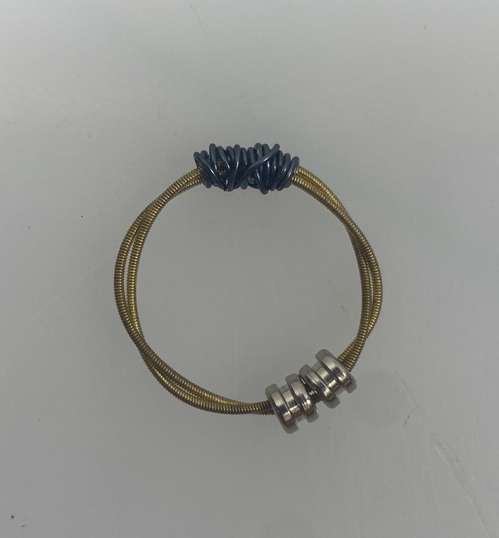 Restrung Metallic Blue and Brass Spring Wire Beaded Ring