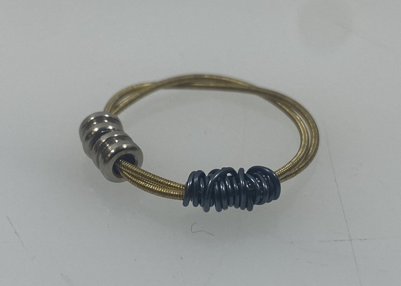 Restrung Metallic Blue and Brass Spring Wire Beaded Ring