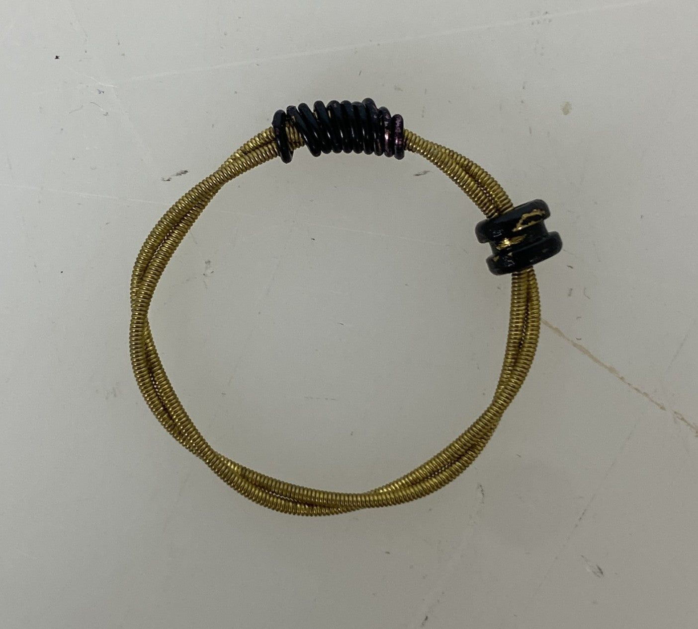 Restrung Navy Blue and Brass Spring Wire Bead Ring