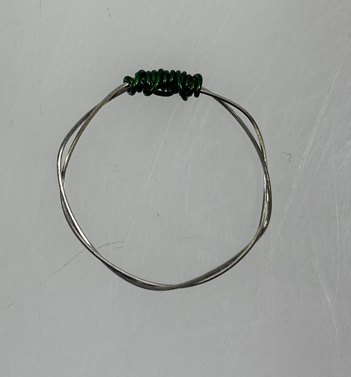 Restrung Silver and Metallic Green Spring Wire Ring