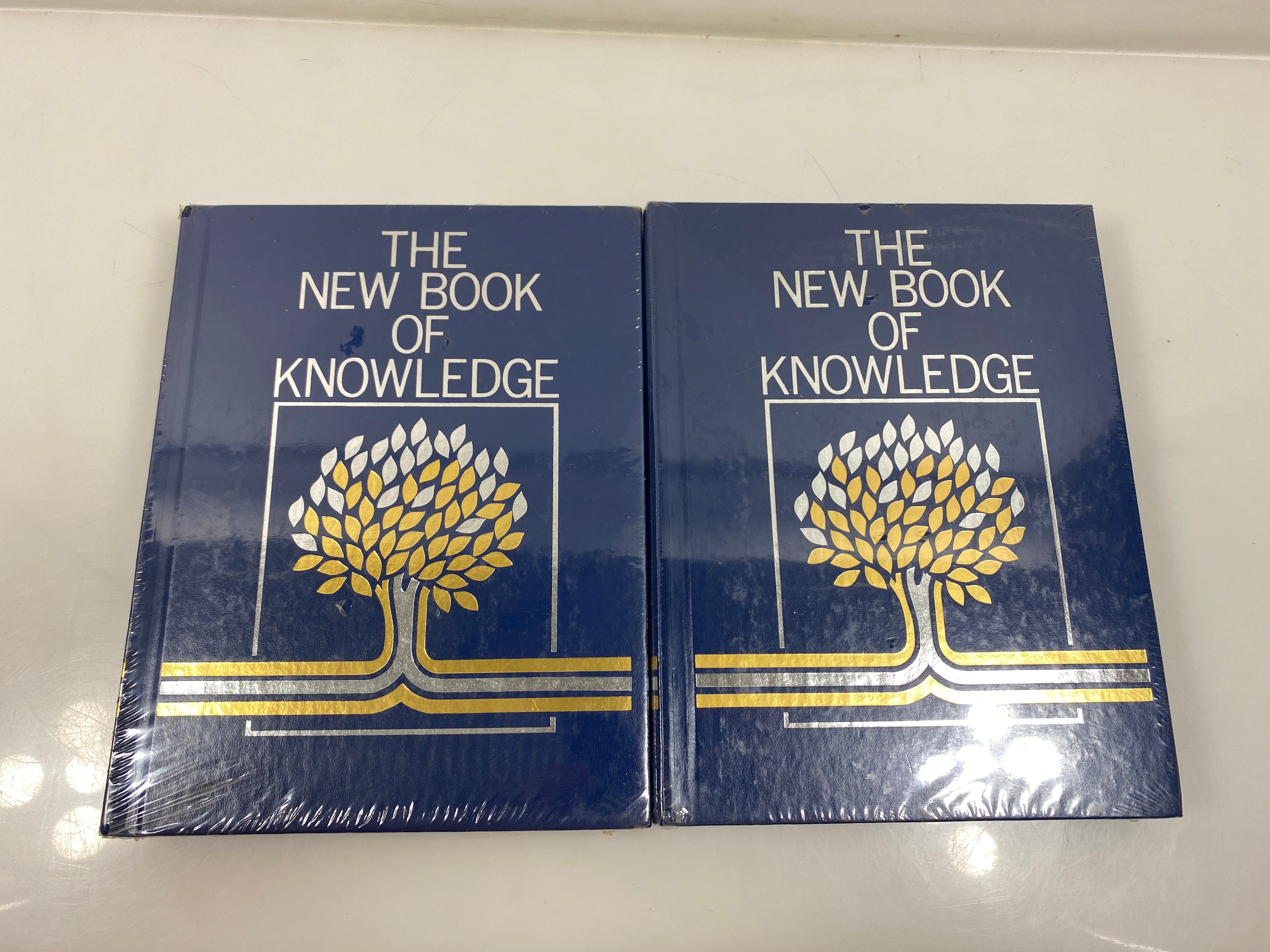 Set of 2 The New Book of Knowledge 1-2 HC
